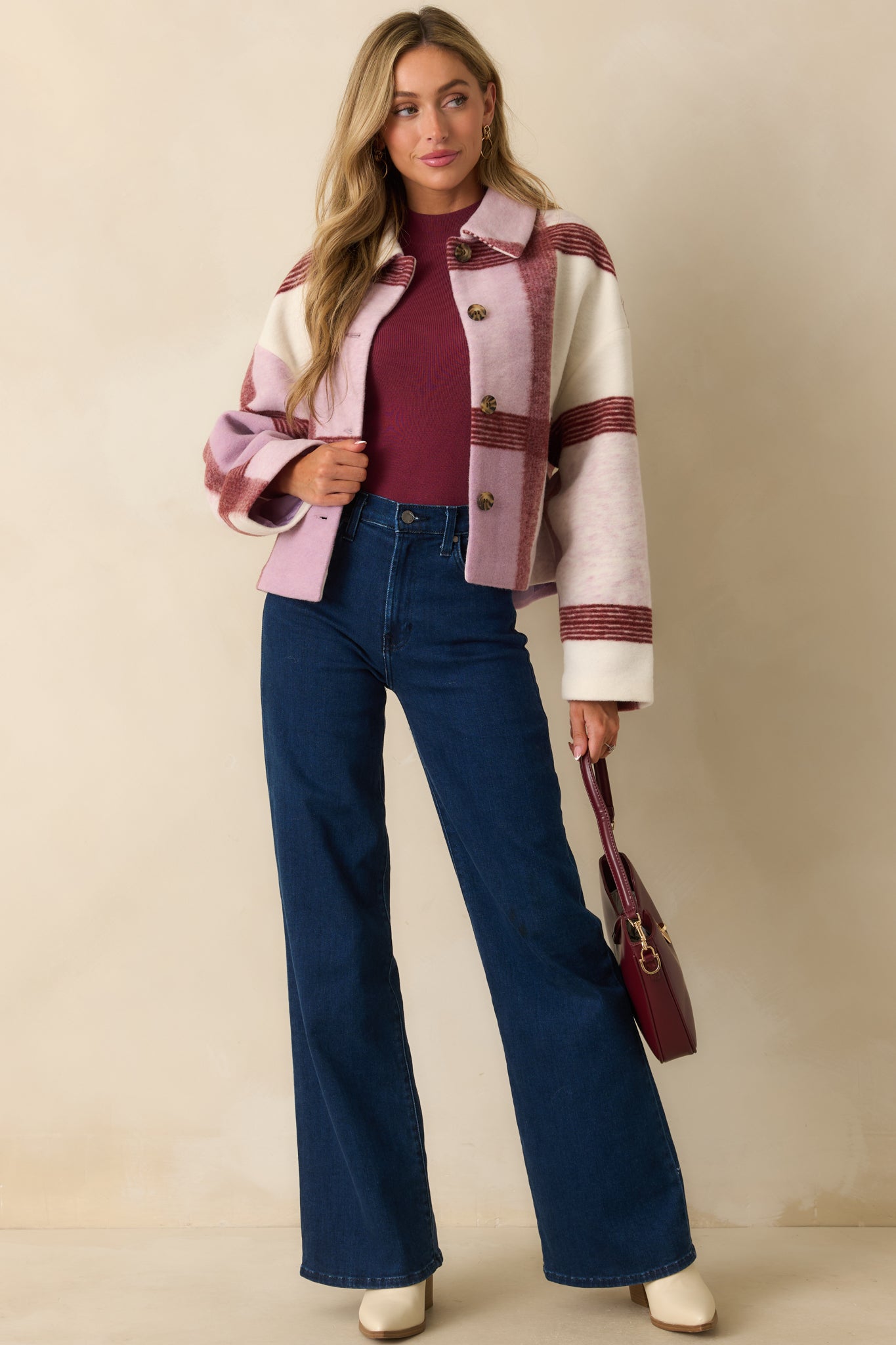 Oversized lilac, burgundy, and cream check jacket displayed with a collared neckline and polished finish.