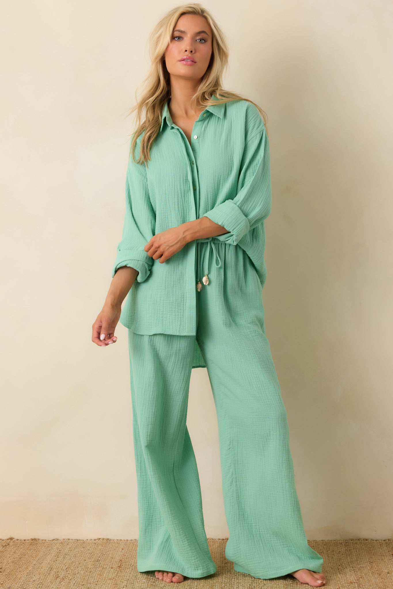 Slightly oversized light green cotton top with breathable gauze texture and relaxed silhouette.