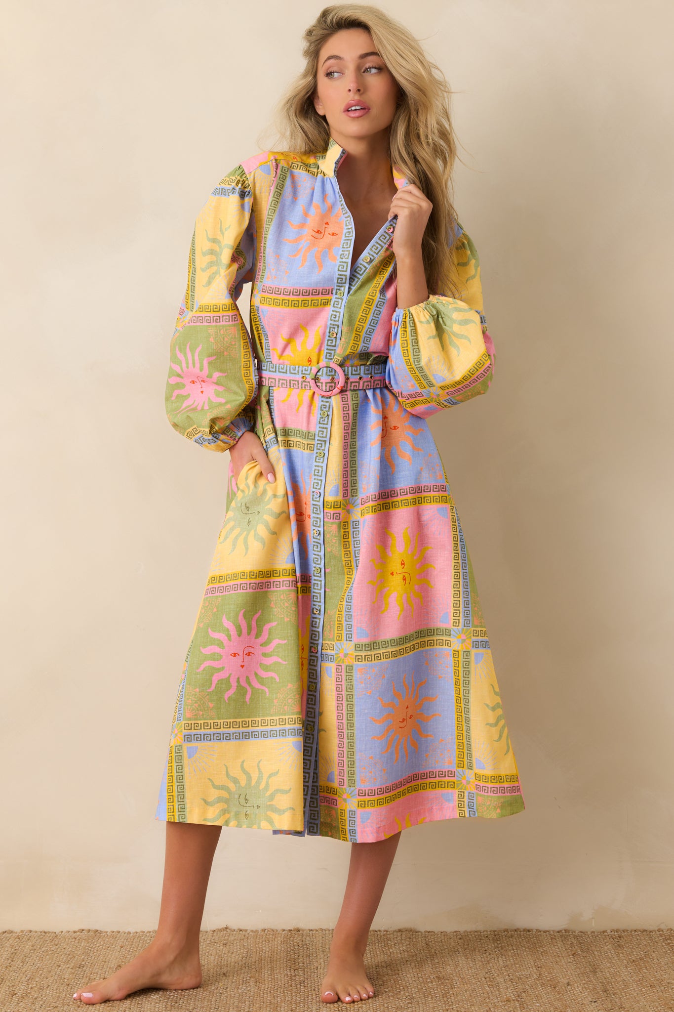 Sun-inspired patchwork midi dress featuring a collared neckline, full button-front design, and a matching belt with a statement buckle for a defined silhouette.