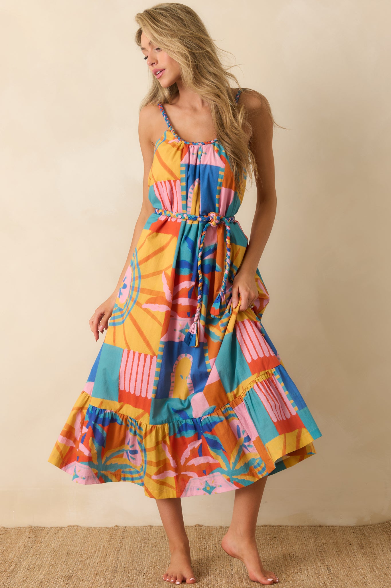 Linen blend midi dress with a gathered neckline, braided trim accents, and an easy, voluminous silhouette.