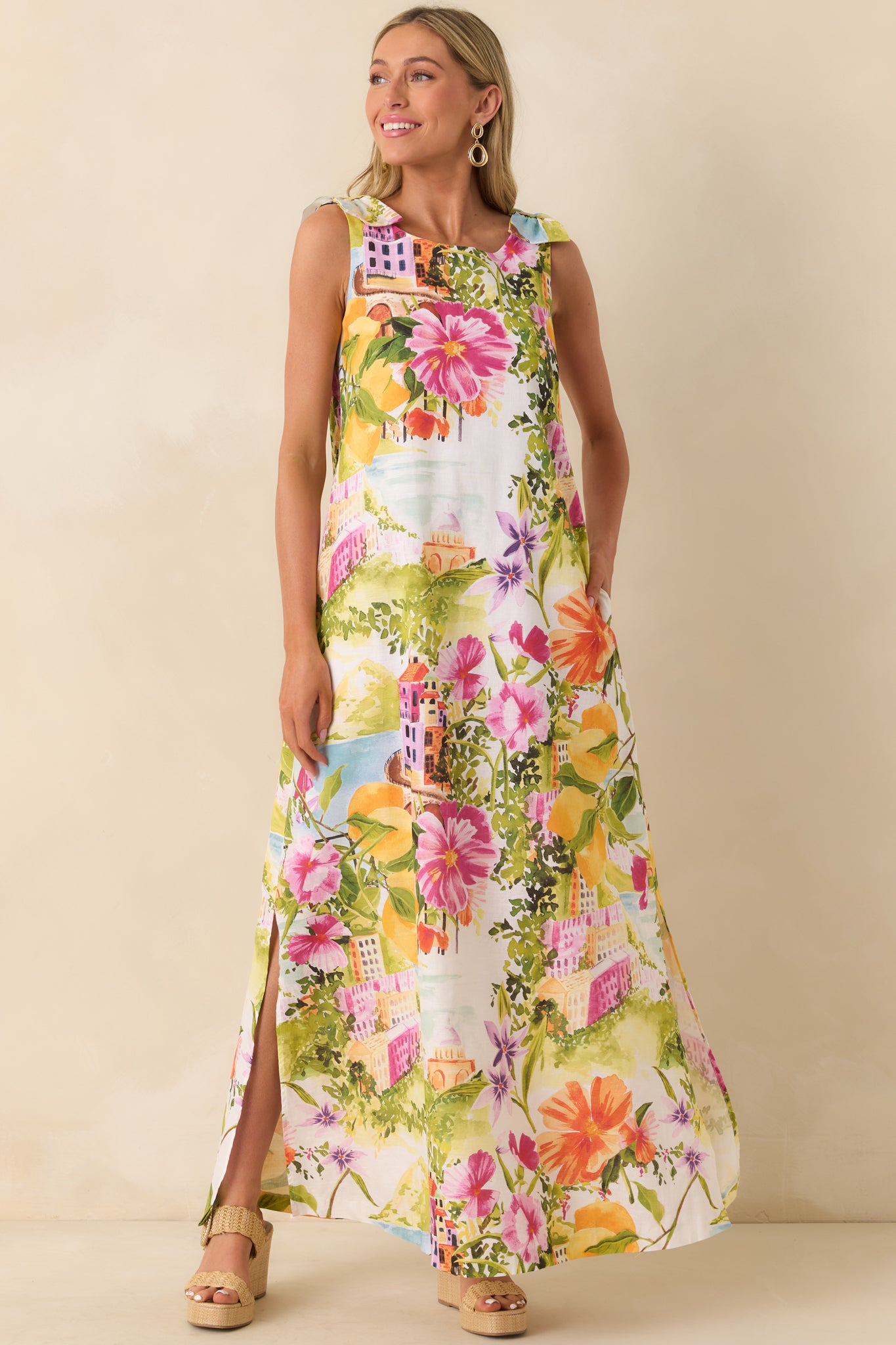 Scenic coastal print maxi dress with floral and citrus pattern and relaxed silhouette.