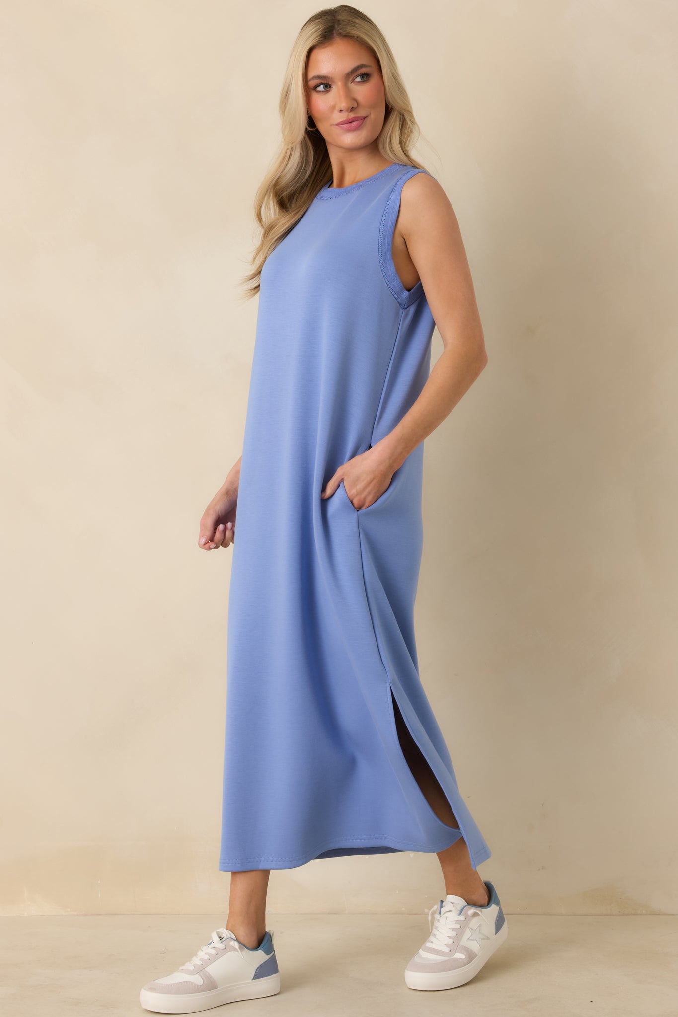 Periwinkle blue sleeveless maxi dress emphasizing the lightweight stretch fabric and simple, versatile shape.
