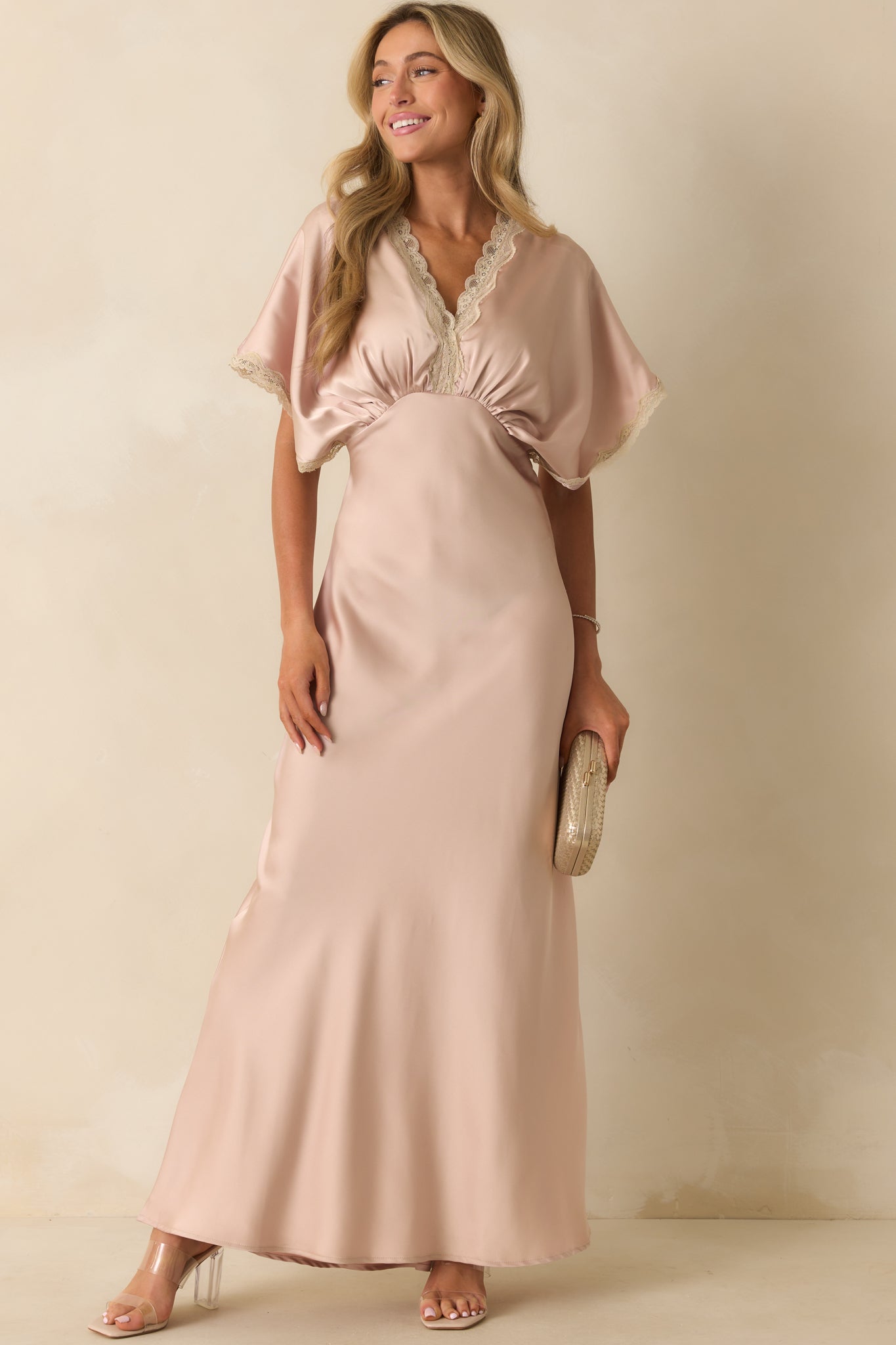 Maxi-length pink satin dress with short kimono sleeves, fitted bust, and smooth drape to the hem.