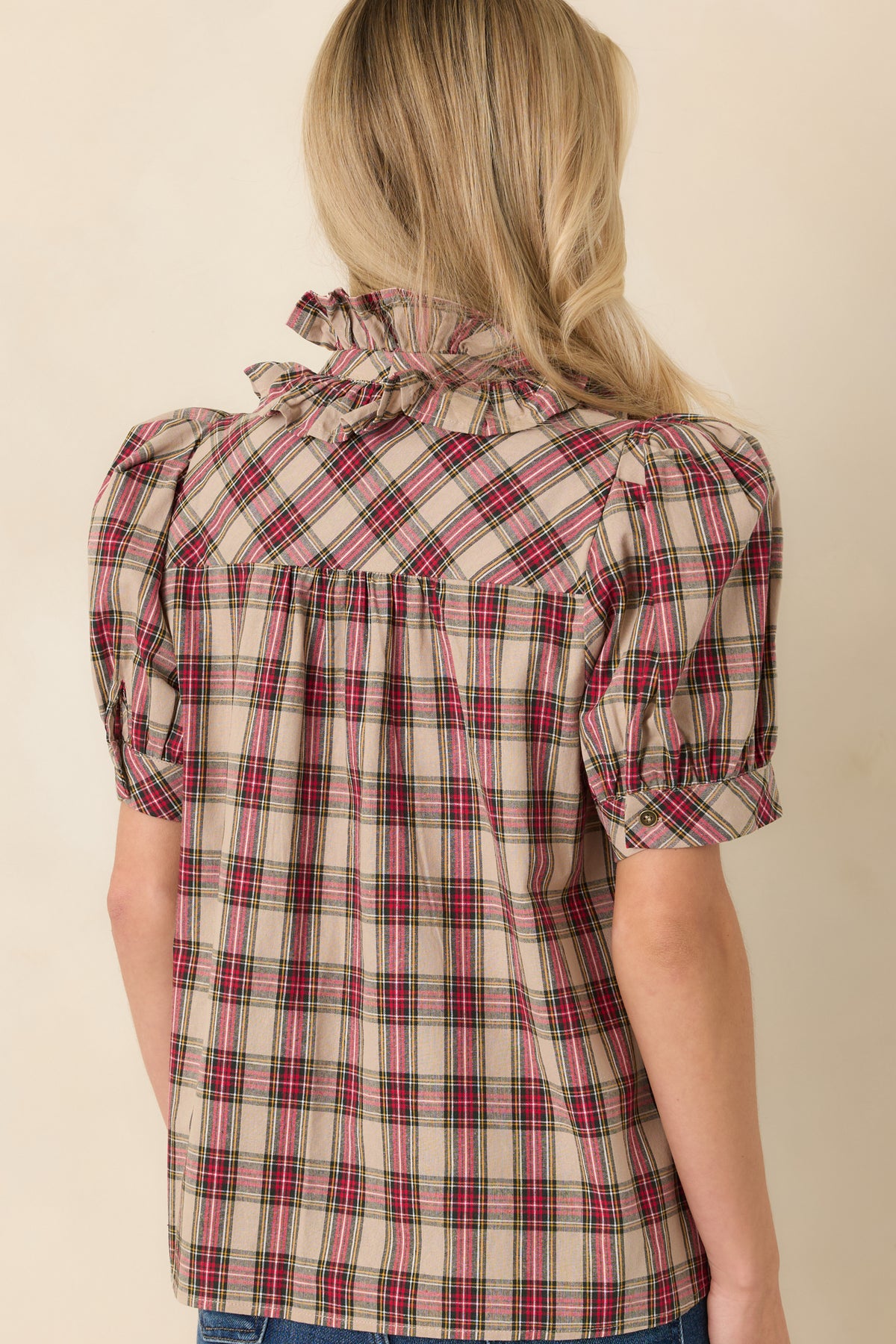 Rear view of the plaid cotton blouse showing the gathered back yoke and relaxed silhouette.