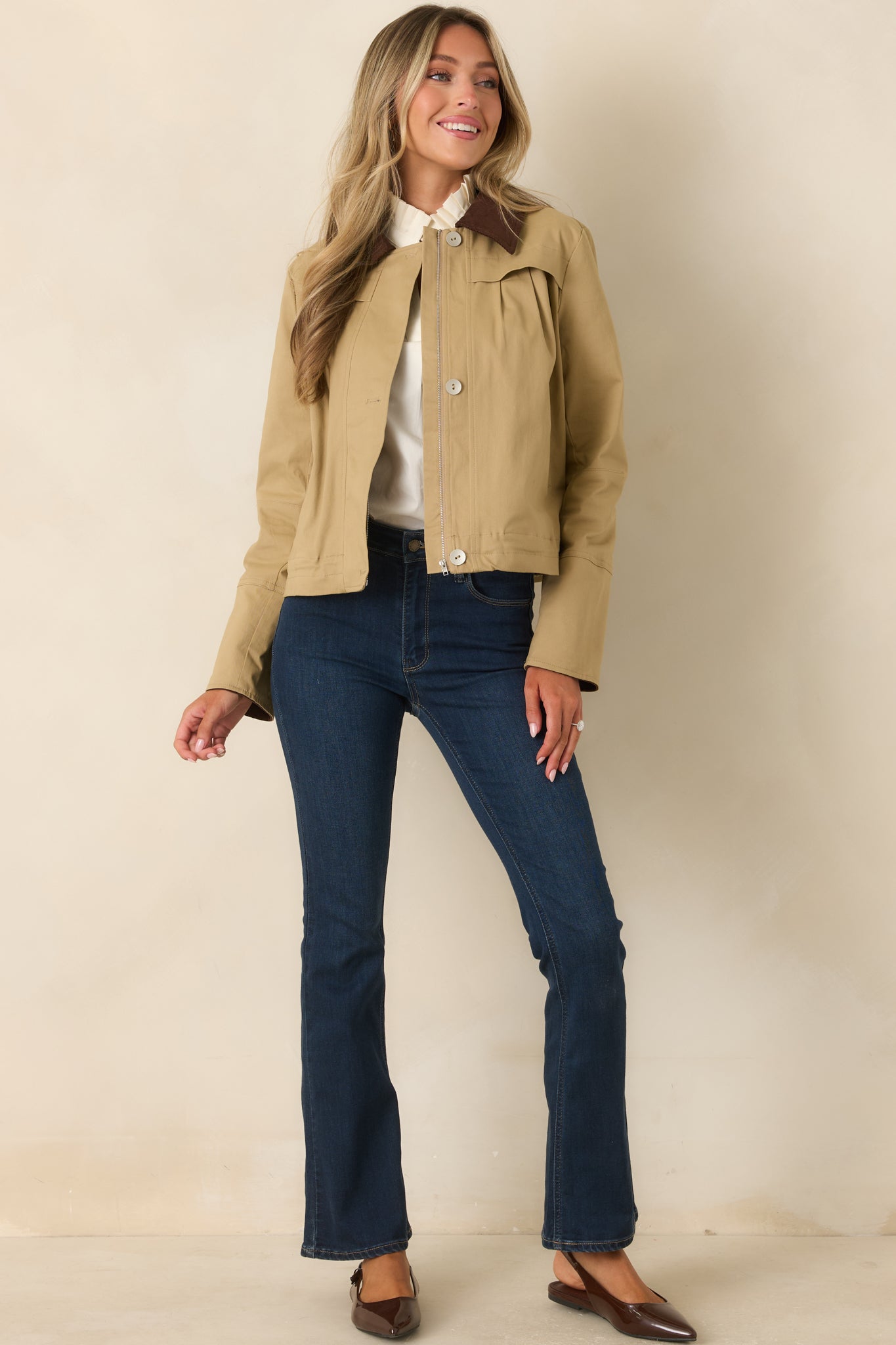 Soft stretch cotton jacket showcasing a relaxed fit, hidden zip-front closure, pleated detailing, and heritage-inspired styling.