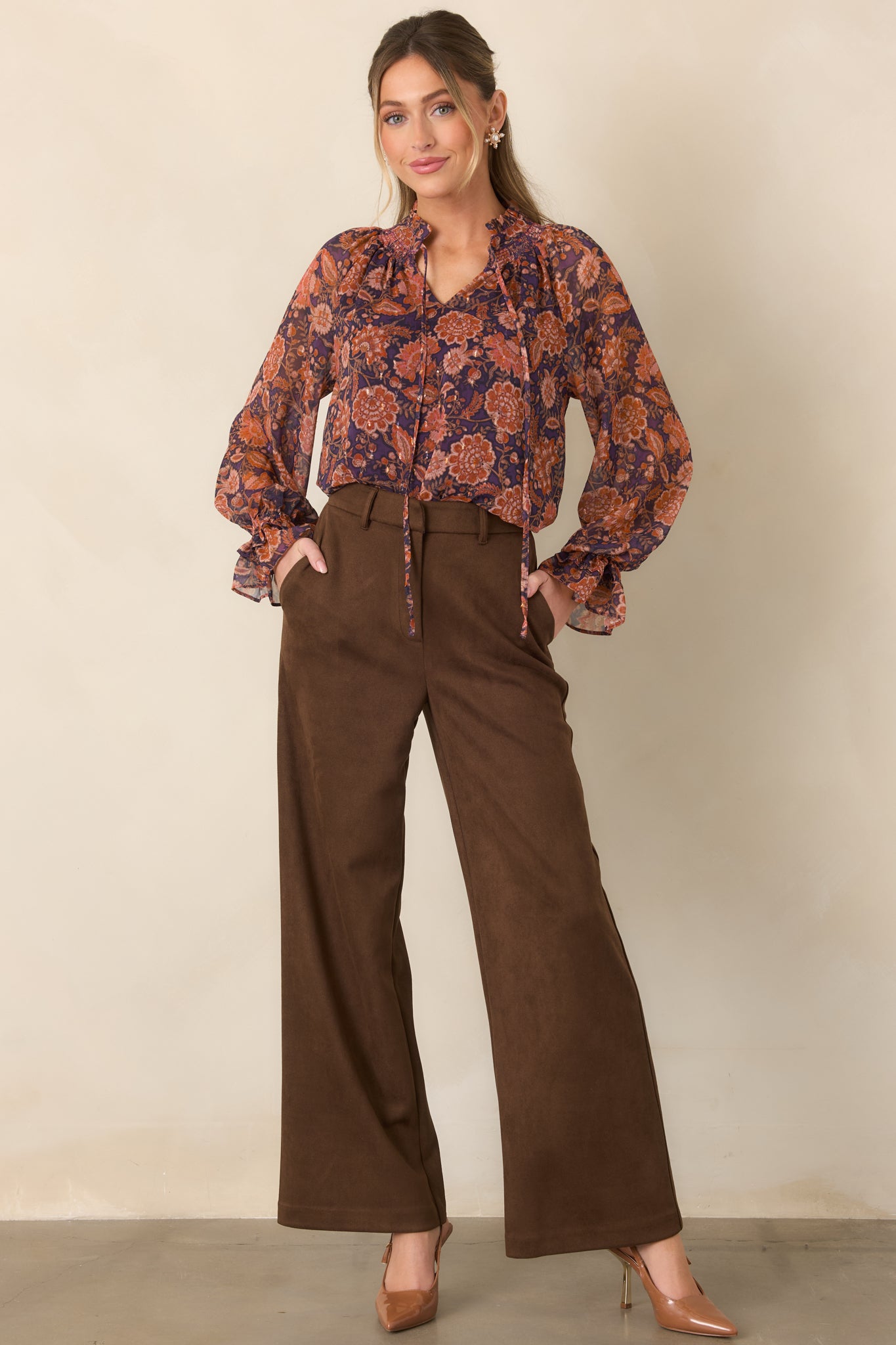 Romantic sheer floral blouse showcasing plum, rust, coral, and muted pink tones with delicate neckline ties.