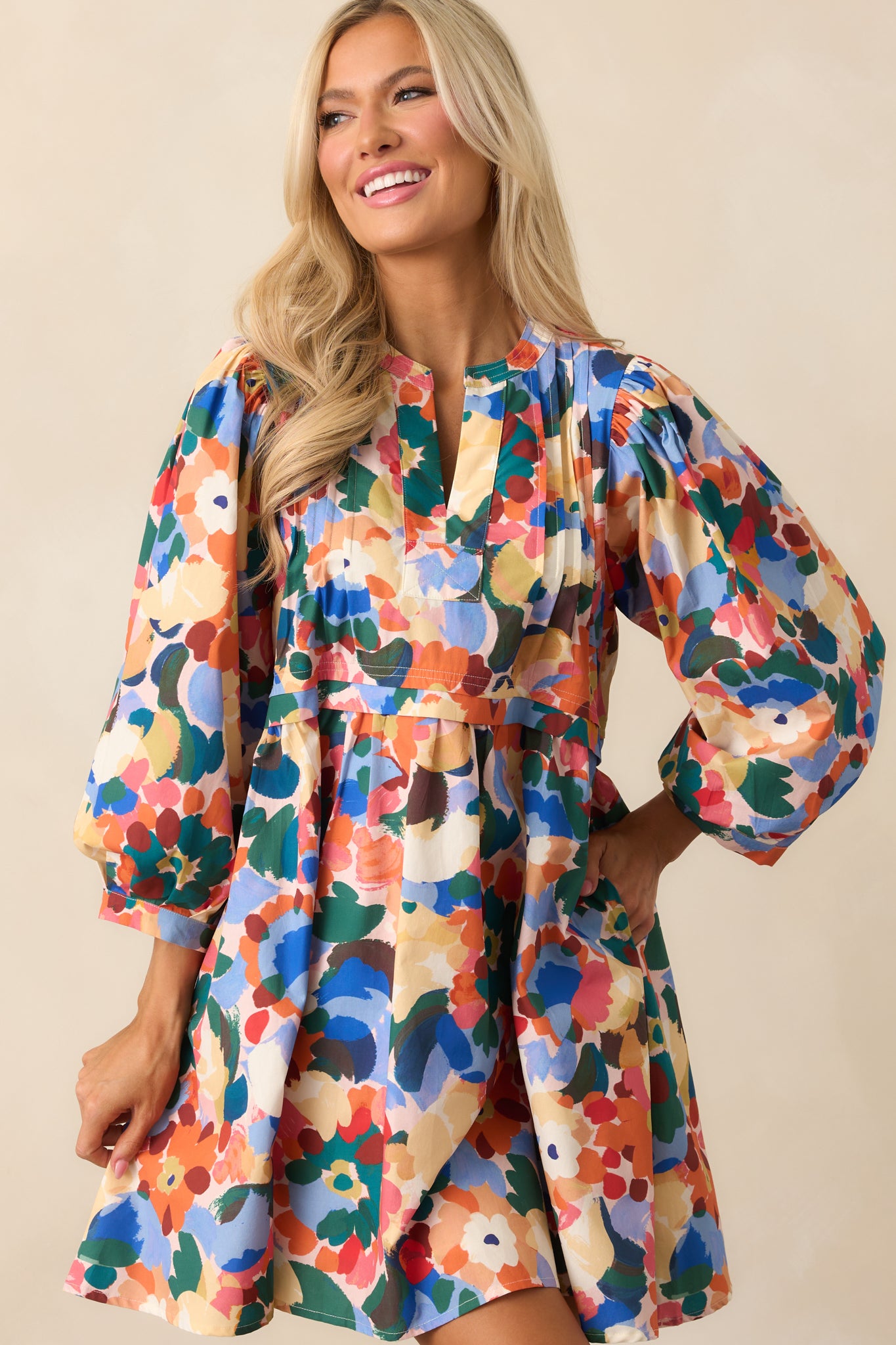 Cropped look highlighting the long balloon sleeves and button cuffs.