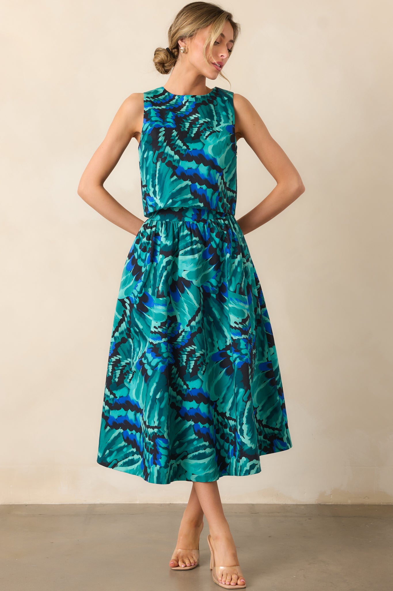 High-rise blue skirt showing its smooth drape and full lining.