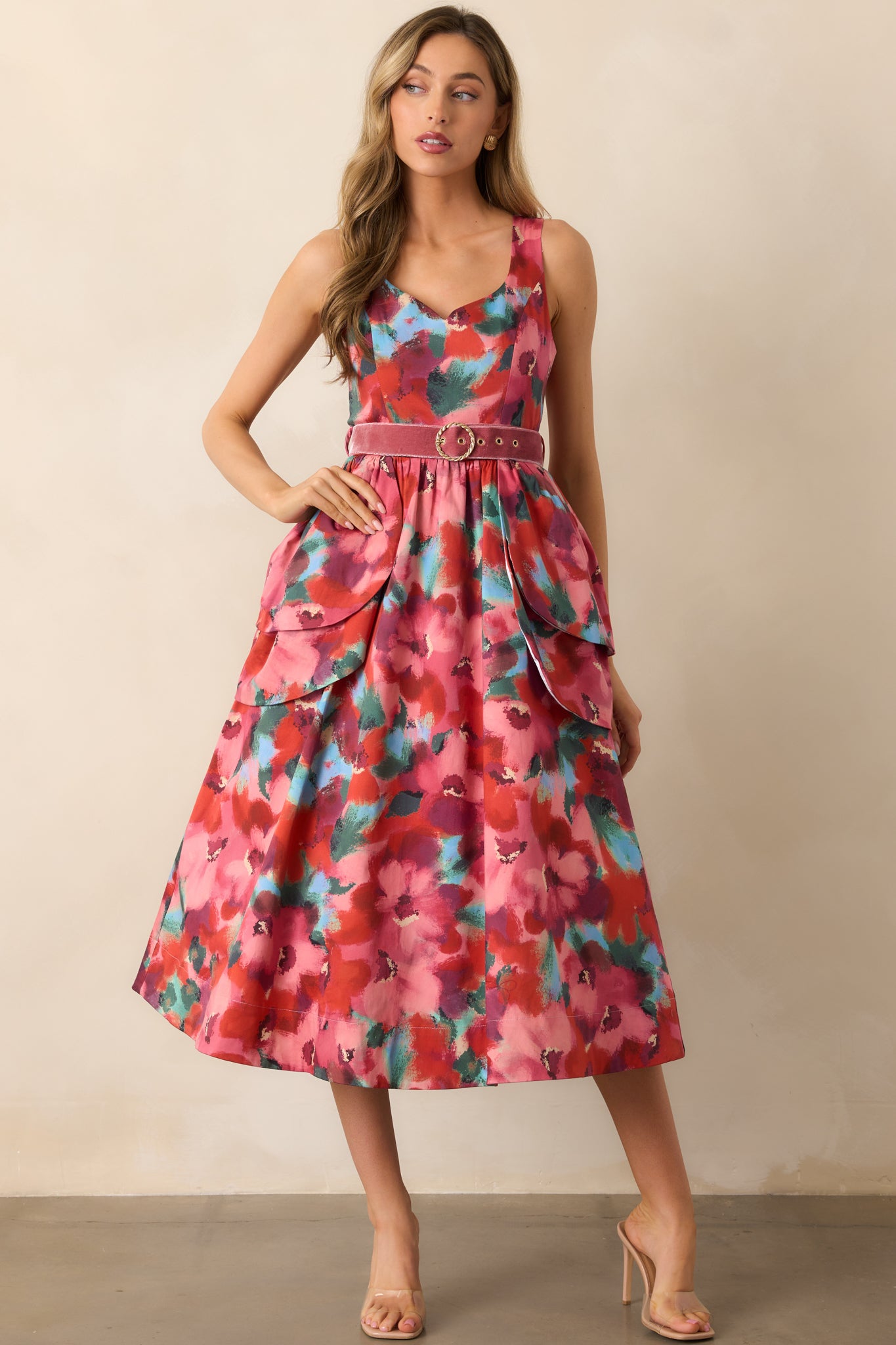 Watercolor floral midi dress showing the velvet belt with gold buckle and smooth drape.