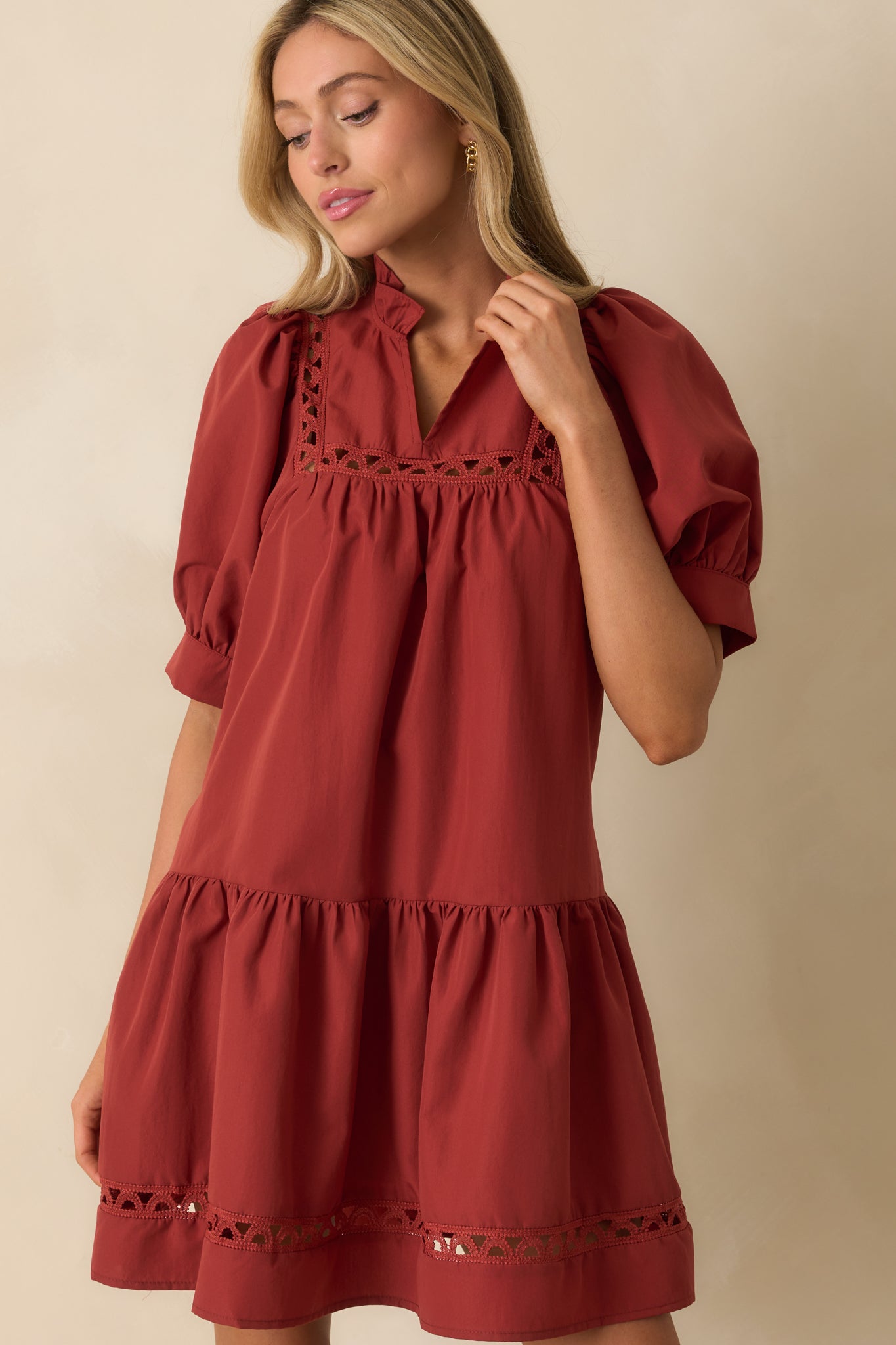 Detail showing puff sleeve shape and ladder lace along the bodice.