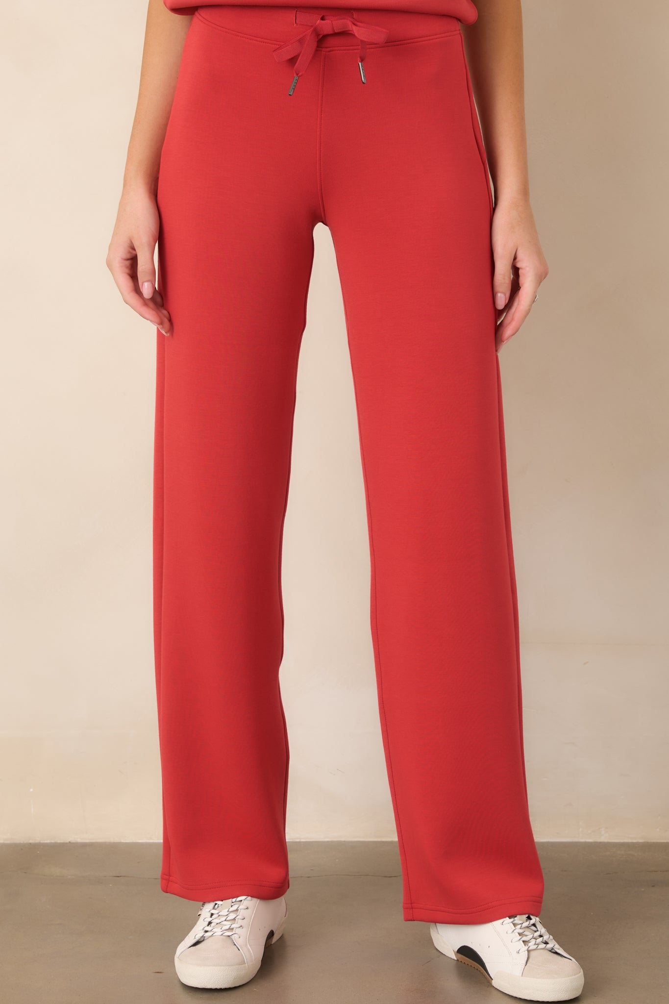 Close view of the pants highlighting the pull-on waistband and adjustable drawstring for a customizable fit.