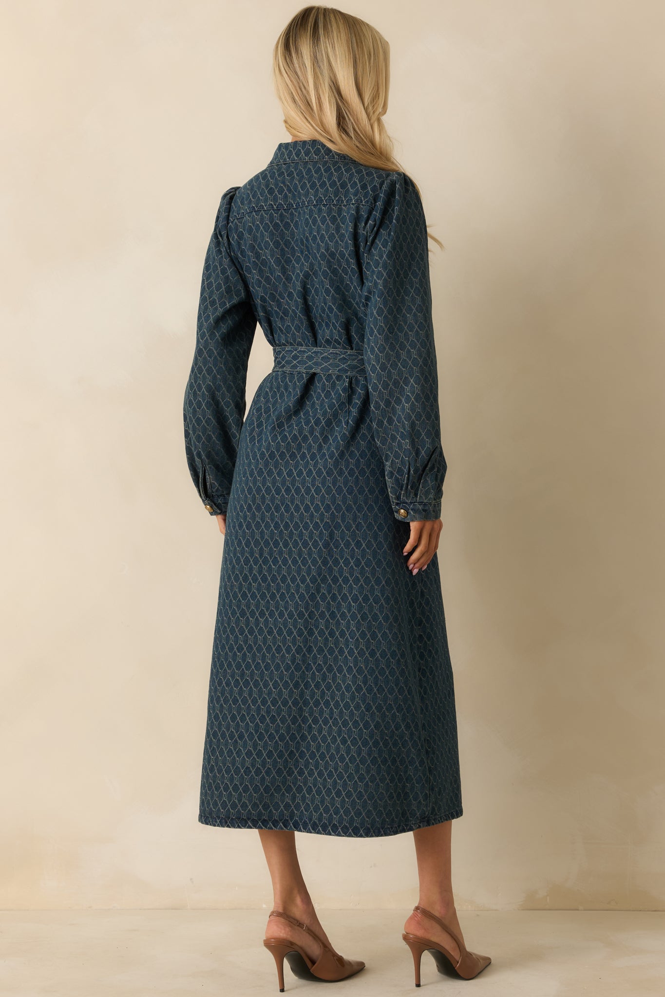 Rear view of the blue denim midi dress displaying clean back panels and straight hem finish.