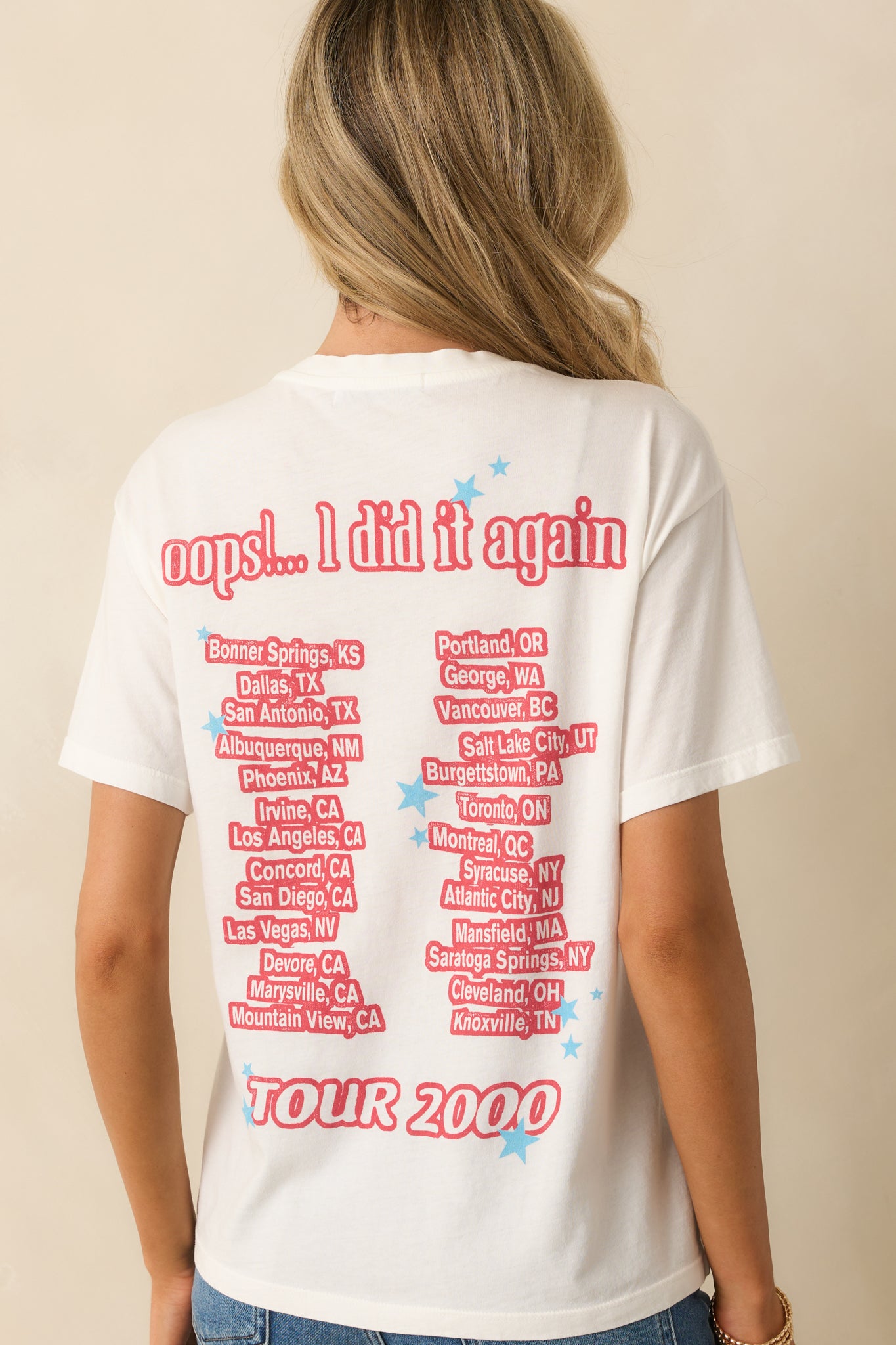 Rear view of the tee displaying the back tour graphic listing cities from her 2000 tour.