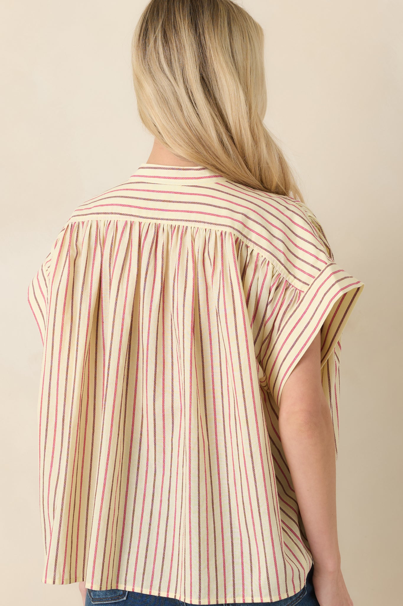 Rear view of top with back yoke gathering and airy movement.