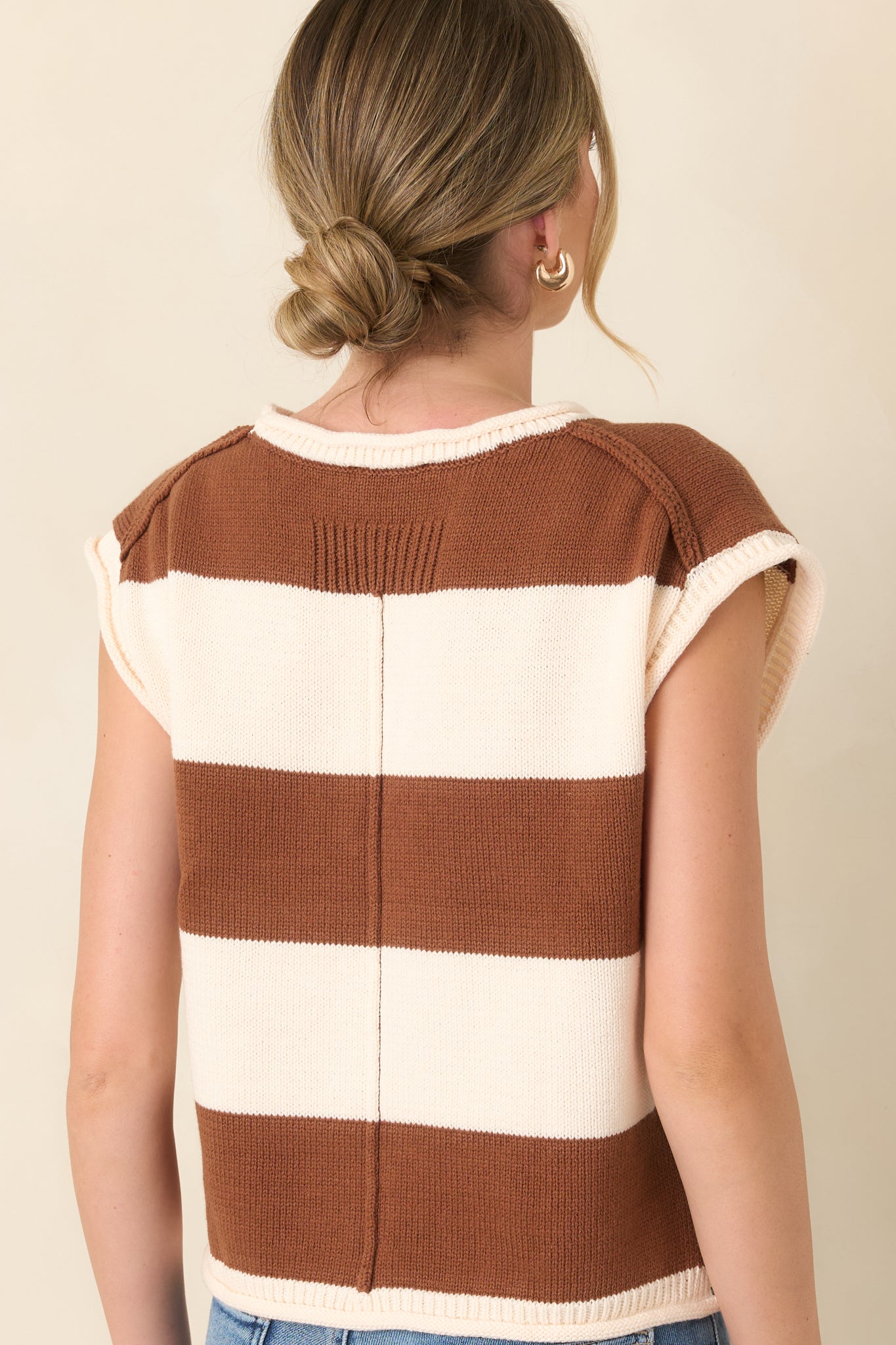 Rear view of the striped cotton-blend knit top featuring its relaxed silhouette, round neckline, cap sleeves, and horizontal stripe pattern.