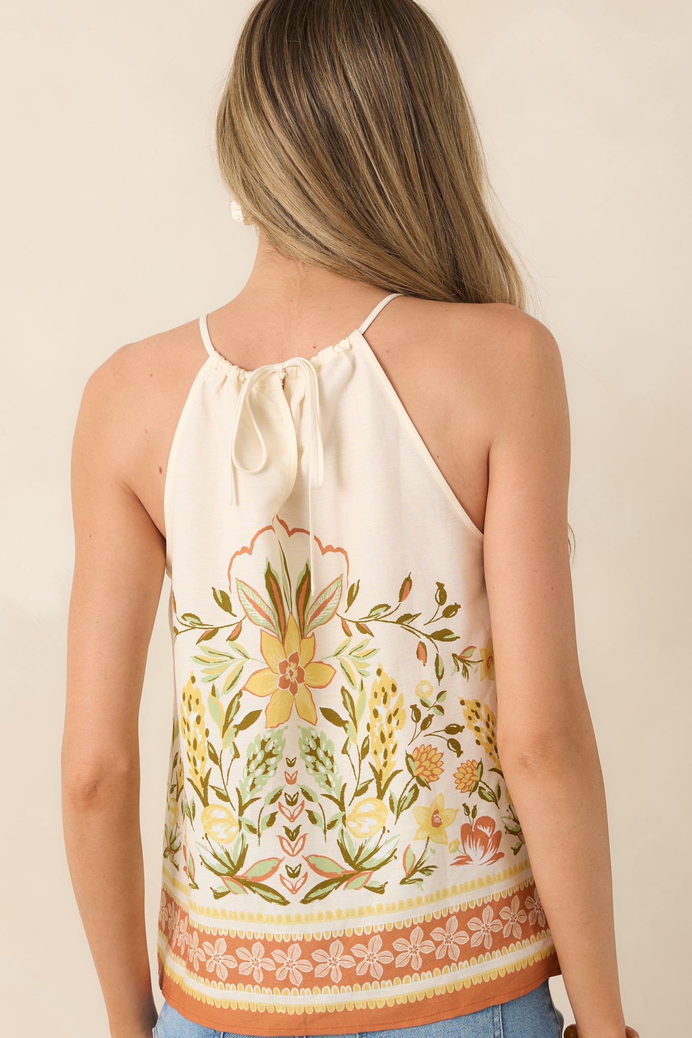 Rear view of top with adjustable tie-back keyhole closure and slender straps.