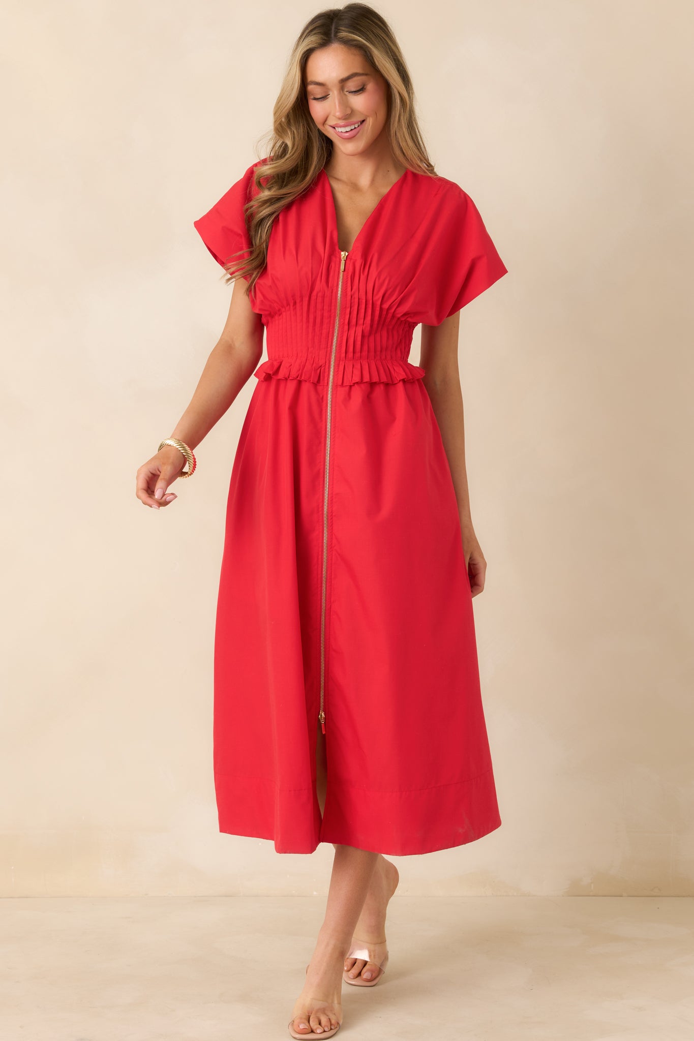 Lightweight cherry red maxi dress with a front zip bodice, V-neckline, short sleeves, and a relaxed A-line silhouette.