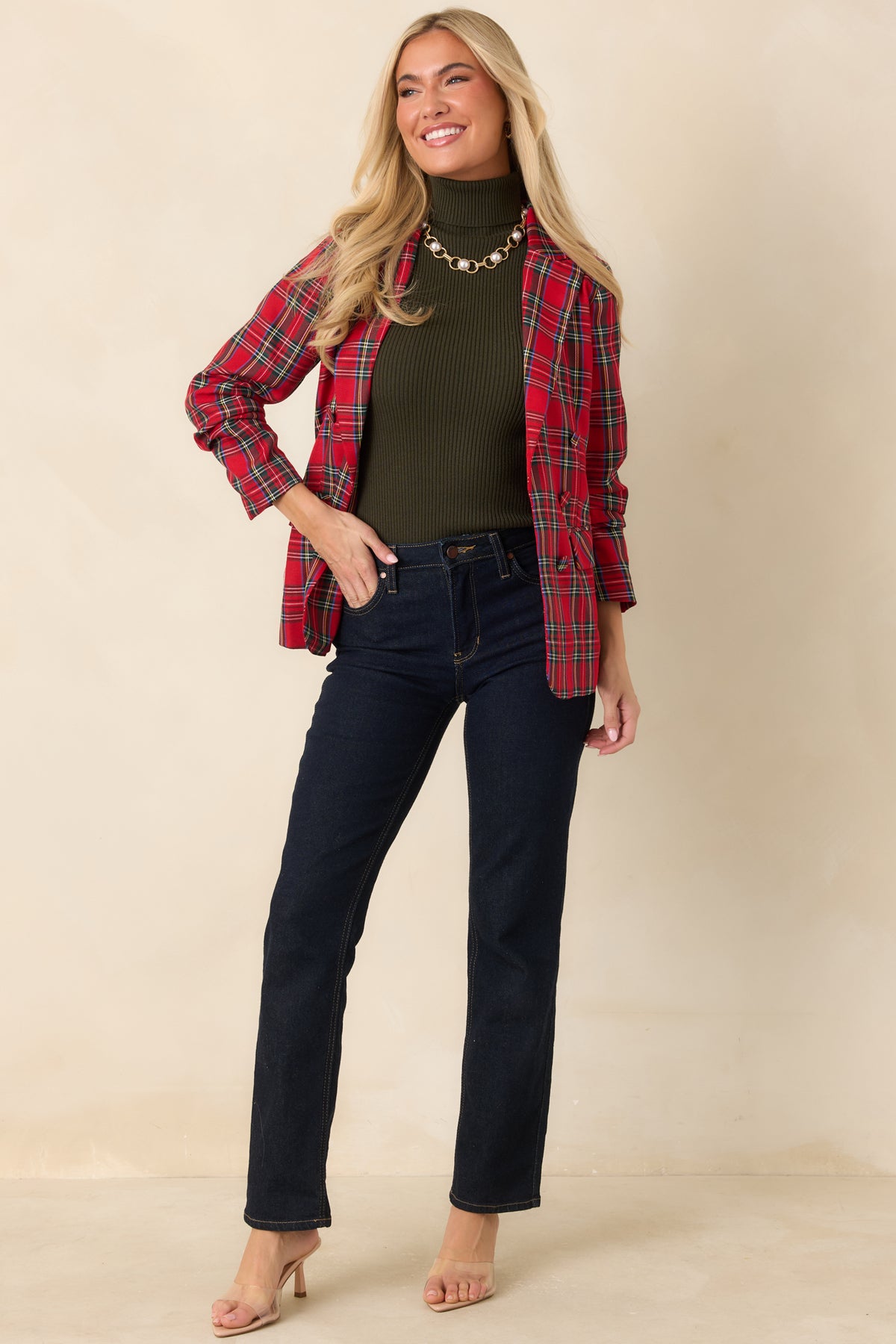 Red plaid blazer with a polished button closure, tailored lines, and softly scrunched sleeves.