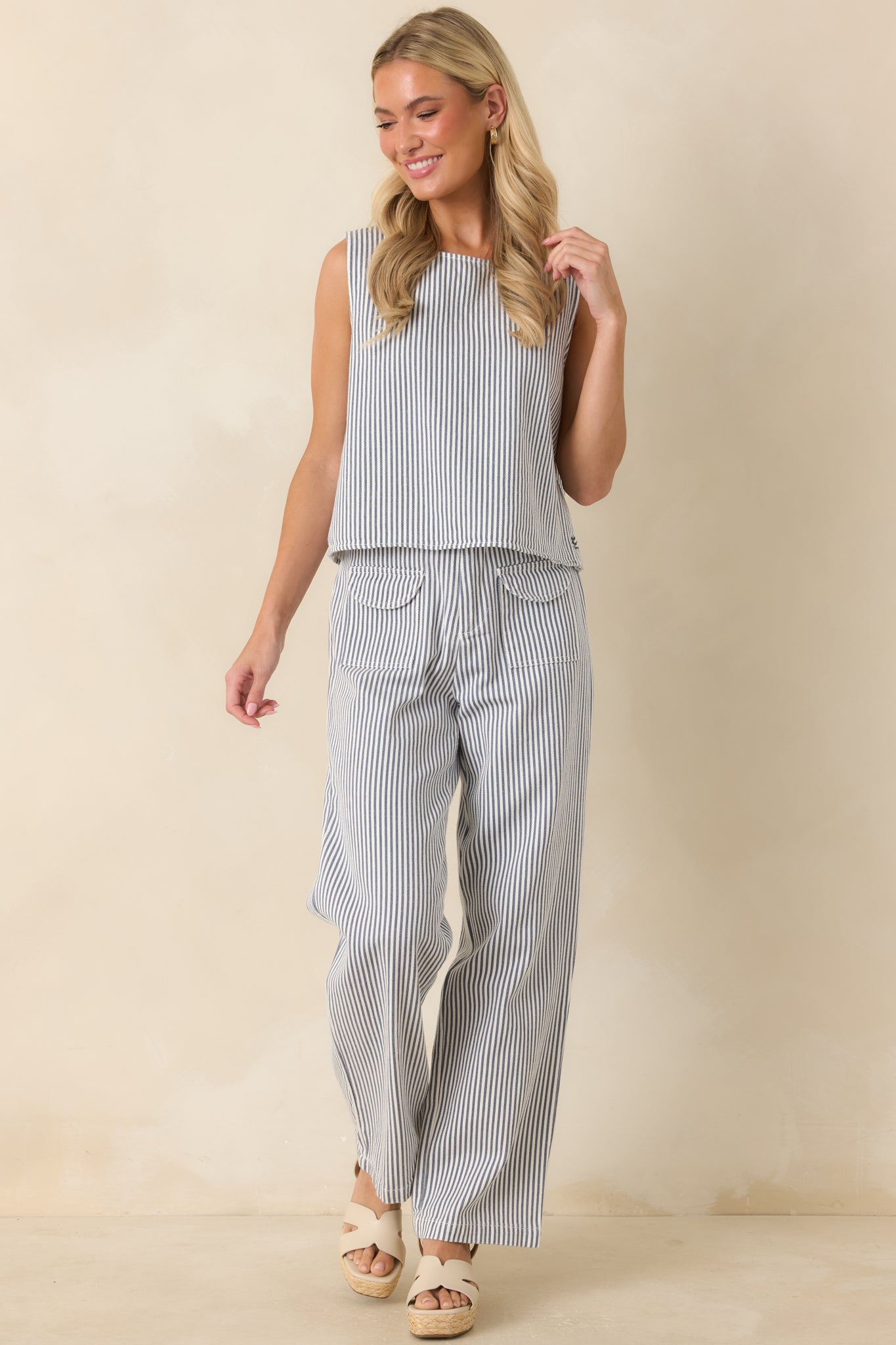 Relaxed striped top with a slightly boxy silhouette, blue and ivory color palette, and effortless everyday style.