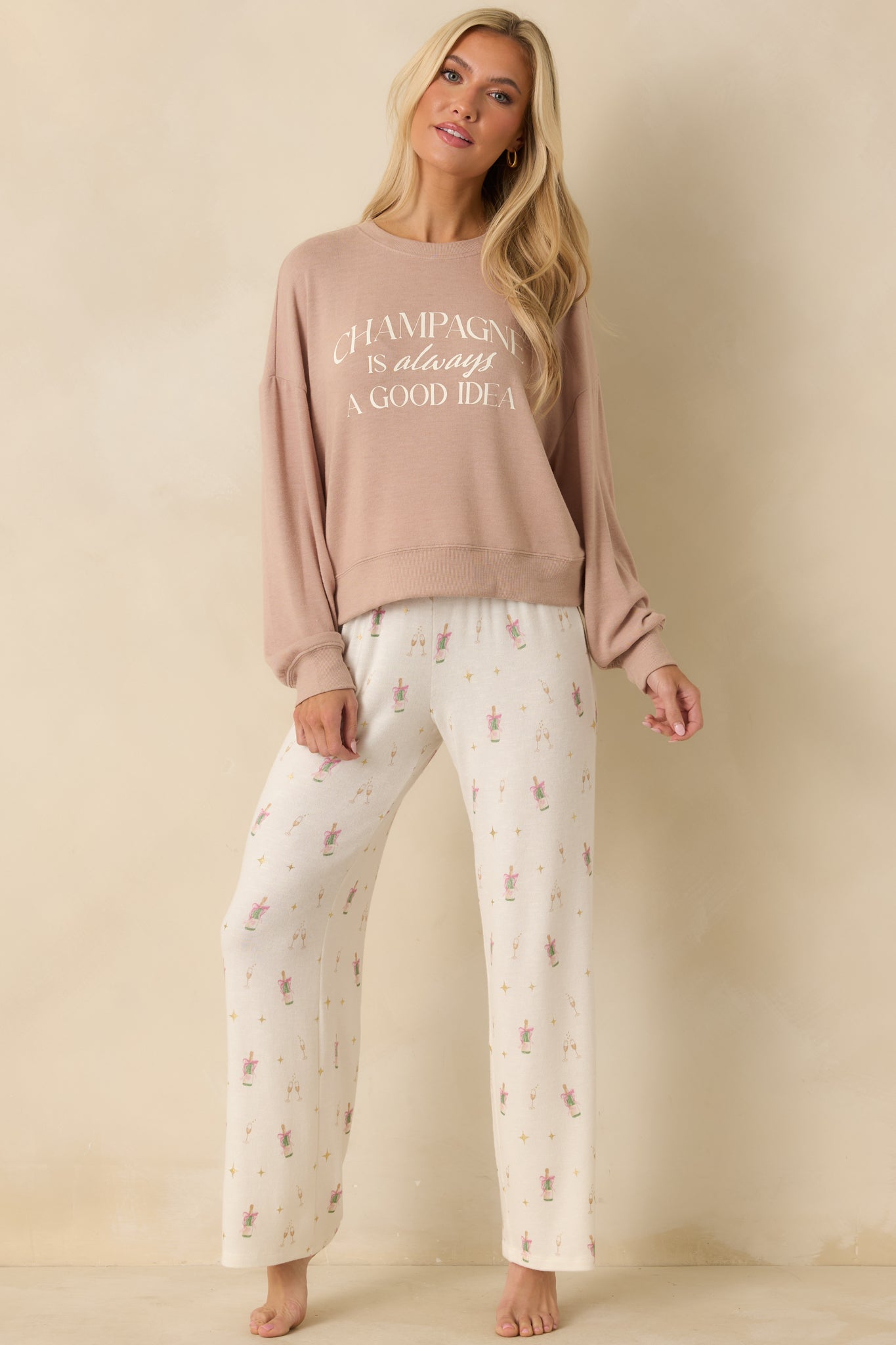 Relaxed knit top featuring smooth fabric texture and casual front design.