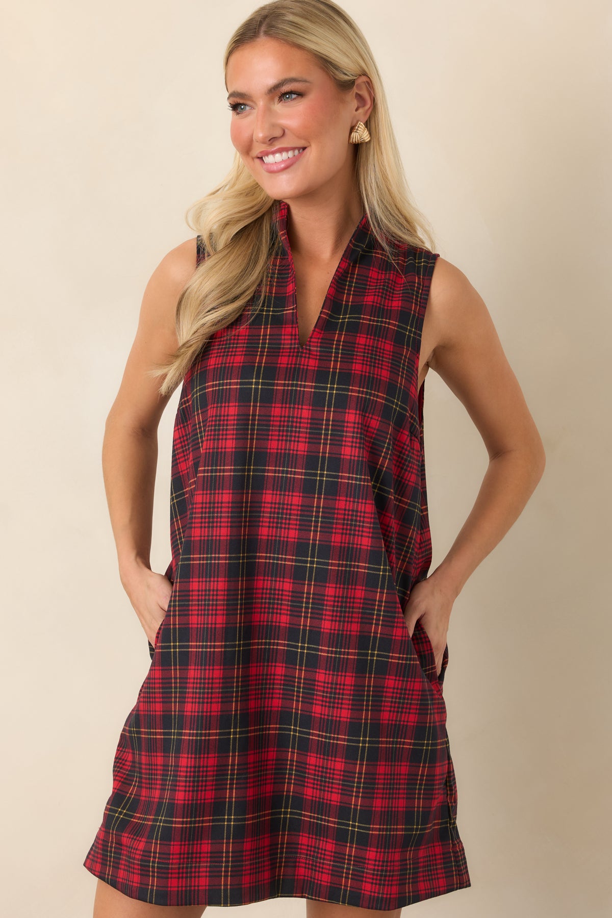 Relaxed red and black plaid mini dress with a split front and fine contrasting lines.