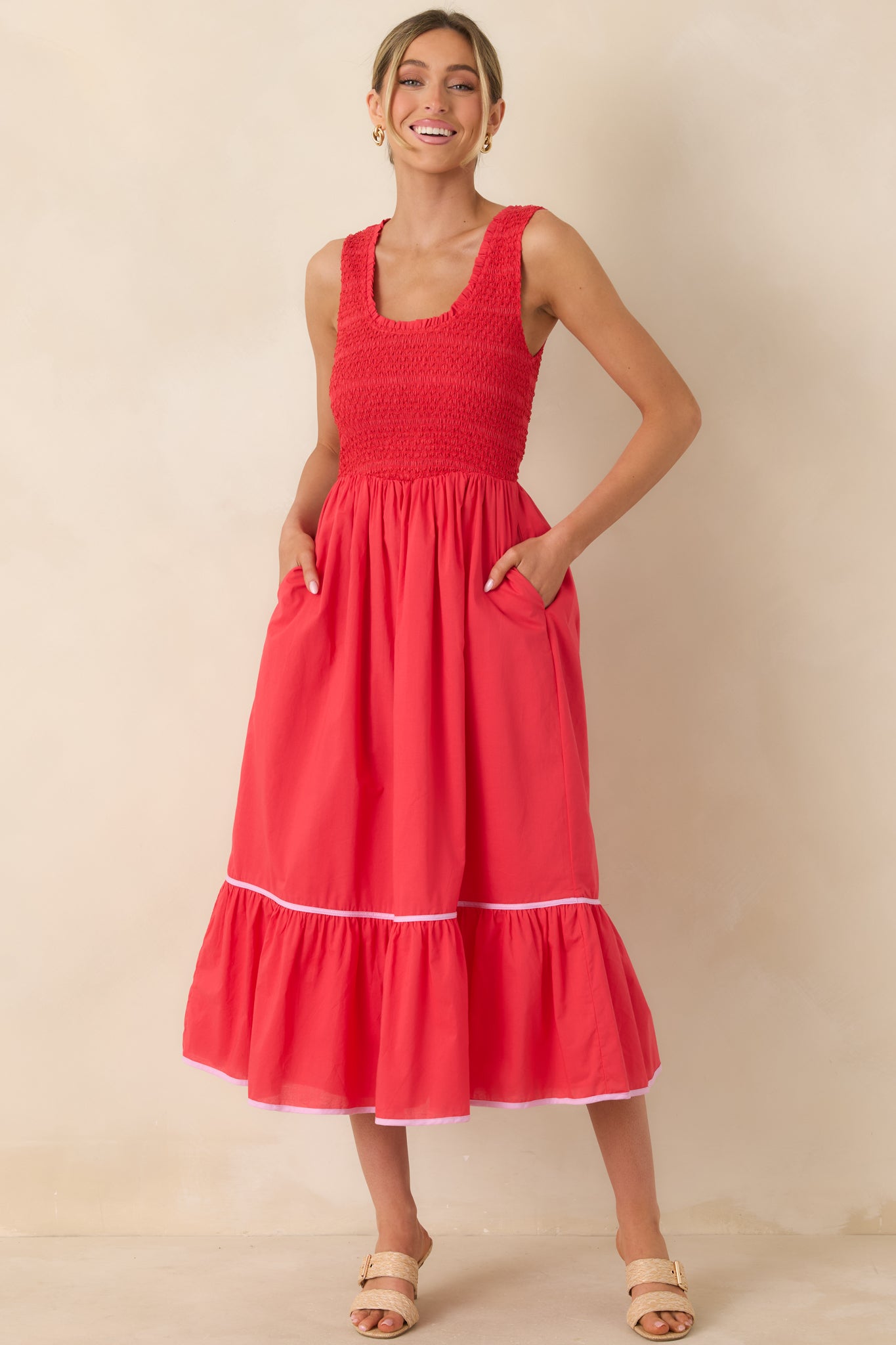 Relaxed red midi crafted from lightweight cotton with tiered shaping and a comfortable stretch bodice.