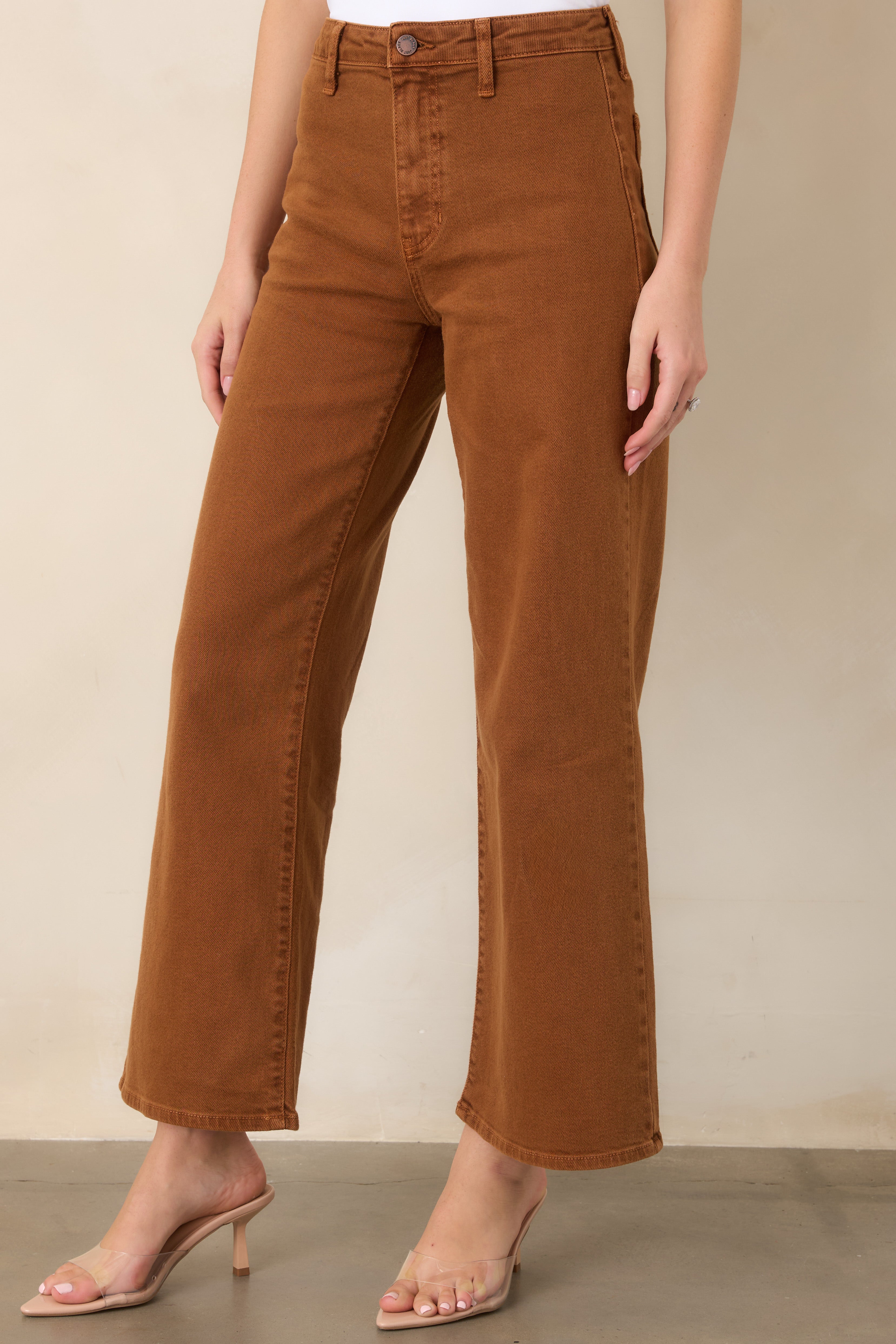 Detailed view of the relaxed wide-leg shape and cotton-rich denim construction, highlighting the subtle stretch and smooth finish.