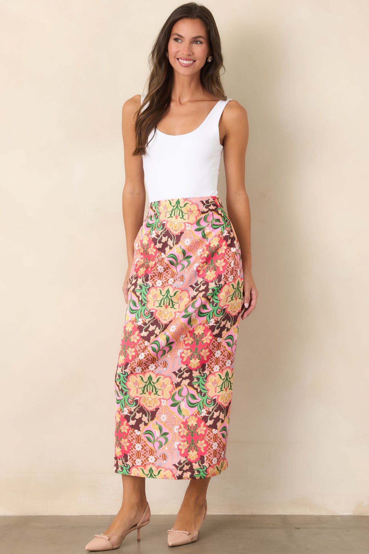 Printed midi skirt with a colorful retro floral pattern, gently flared shape, and lined construction.