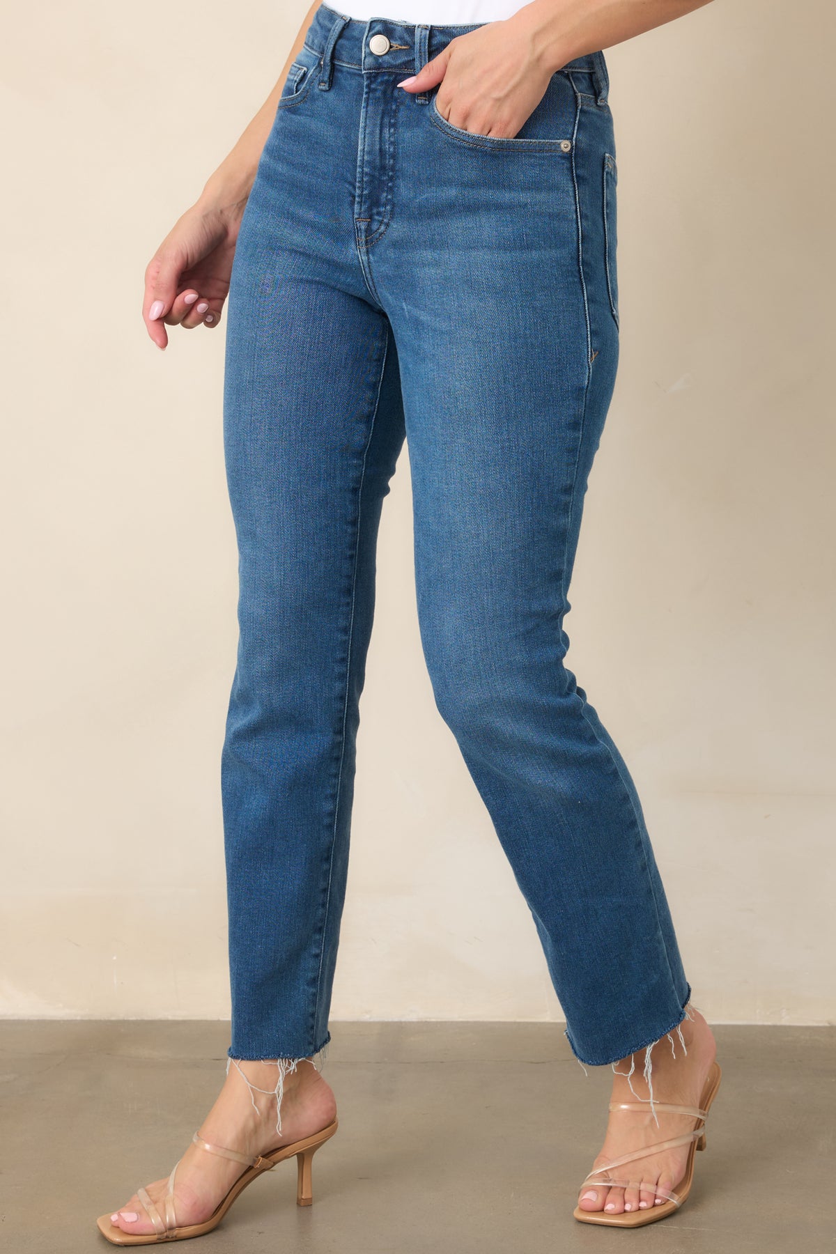 Straight-leg pants showcasing the rich blue wash and subtle whiskering across the front.