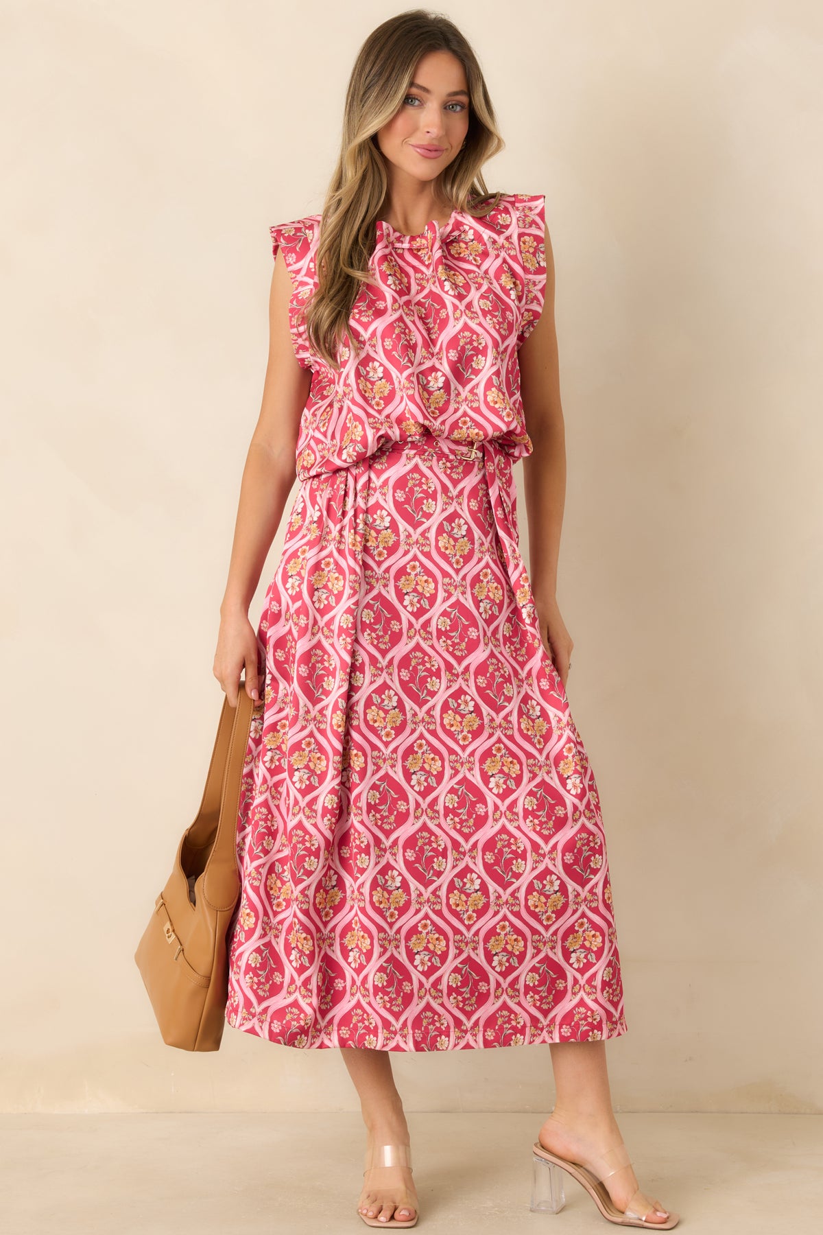 Rich pink midi skirt featuring a pale pink trellis pattern, floral bouquets, and a gently flared silhouette.