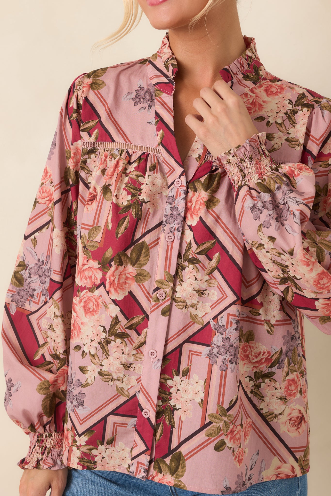 Close-up of the ruffled stand collar and gathered yoke, highlighting the intricate detailing and soft cotton fabric.