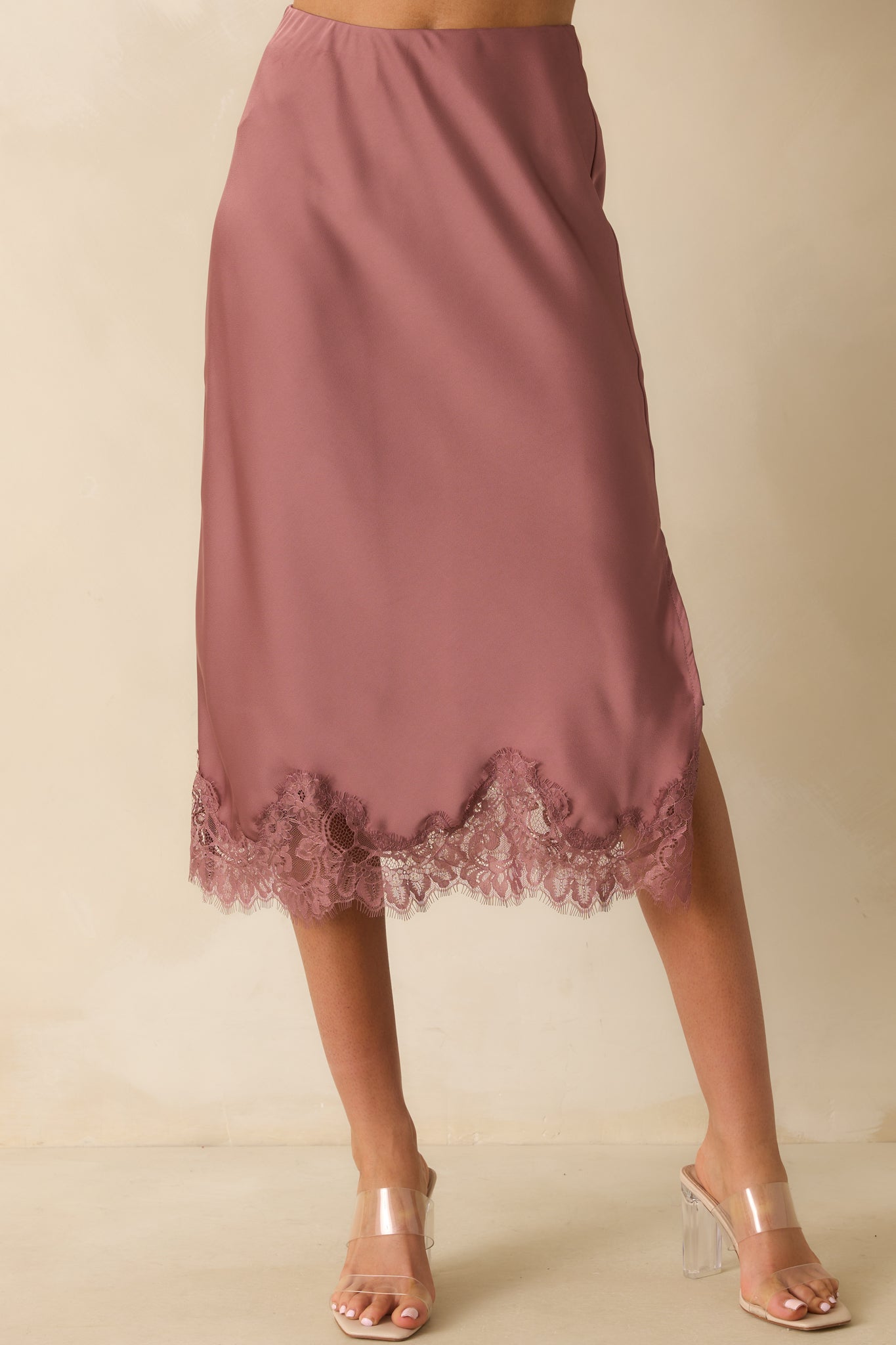 Detail of the scalloped eyelash lace trim at the bottom hem of the skirt.