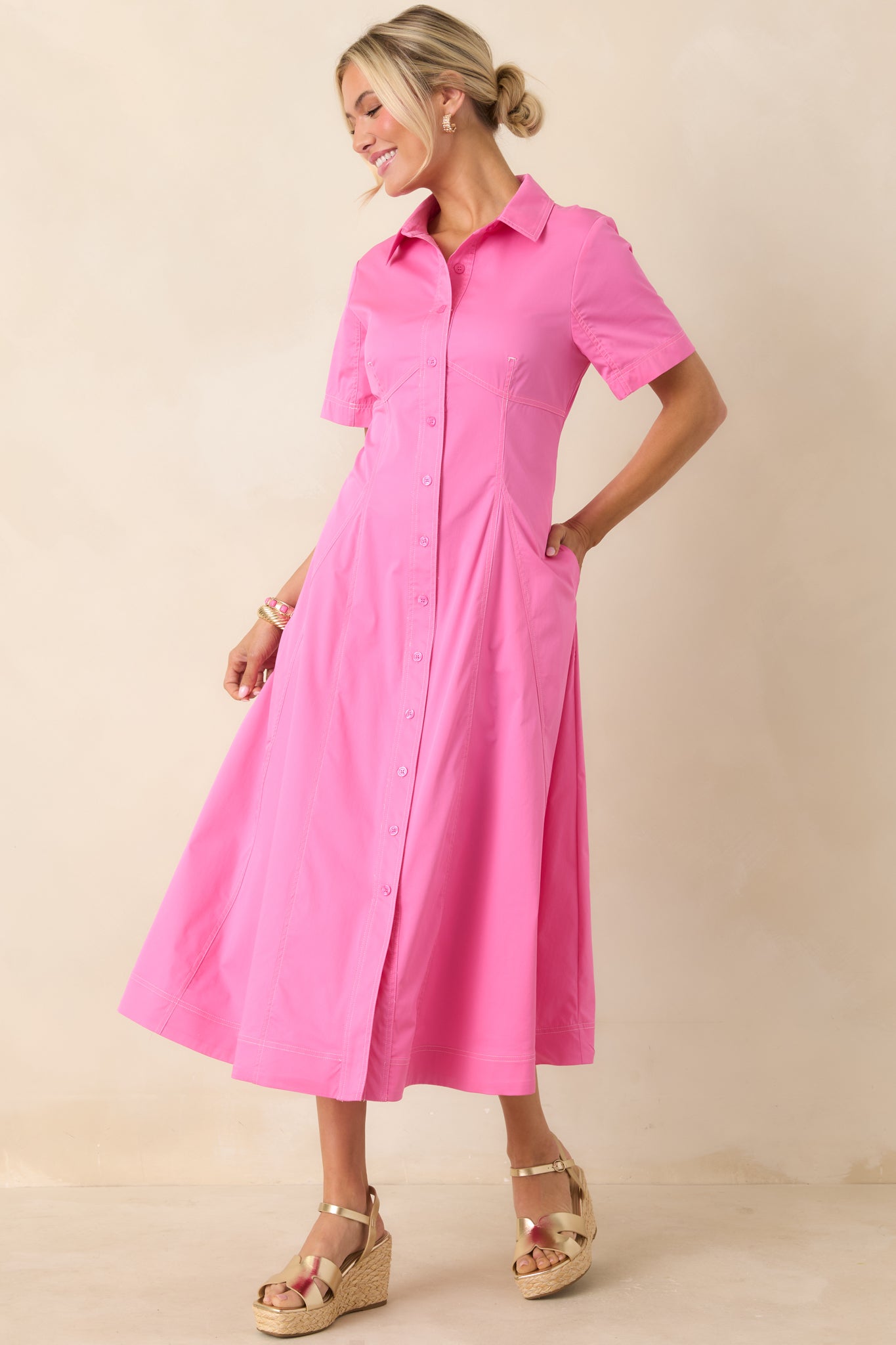 Short-sleeve, collared midi dress with polished fit and easy button closure.