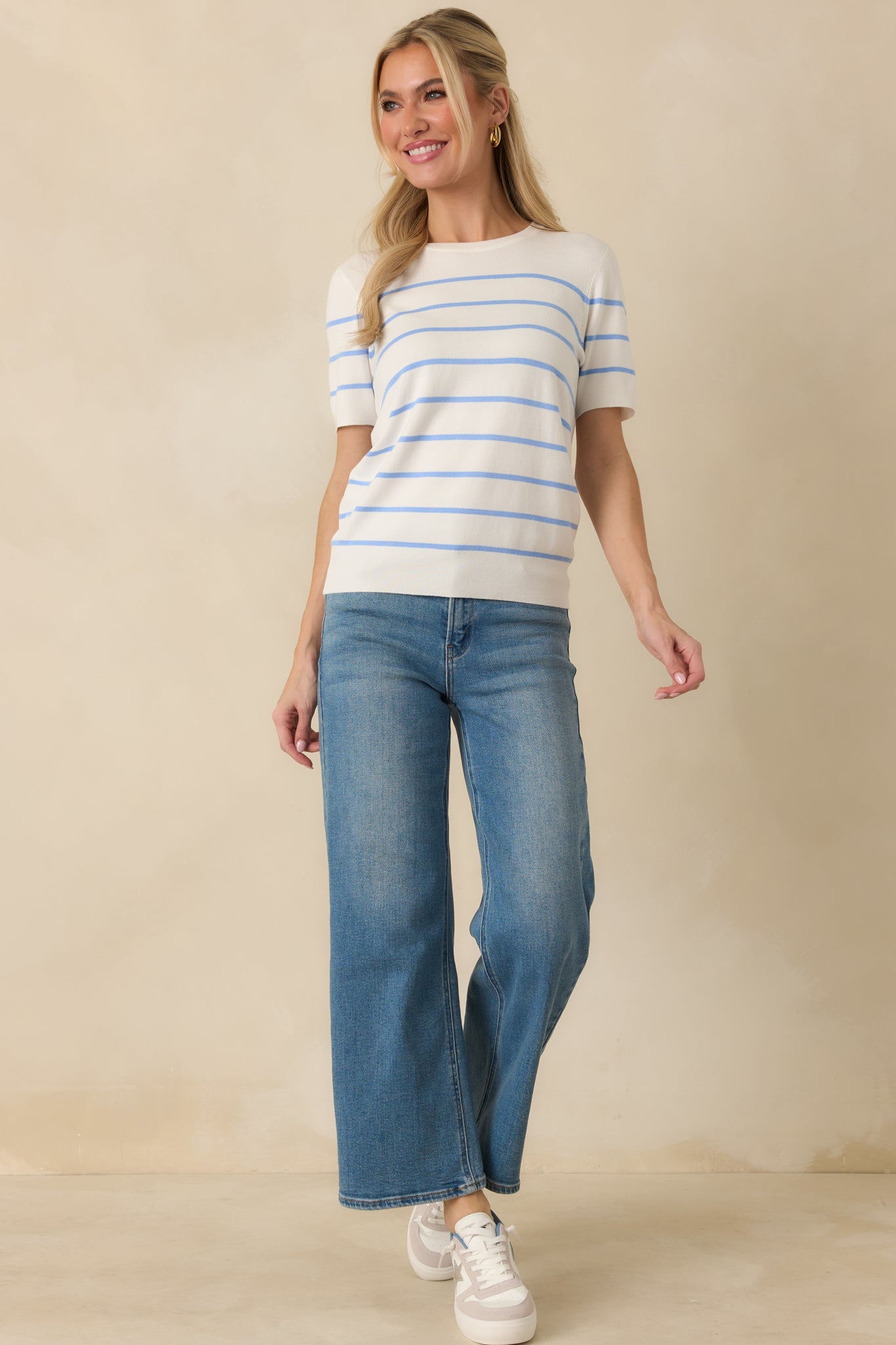 Front view of the short sleeve sweater with ribbed trim at neckline, sleeves, and hem for a structured fit.