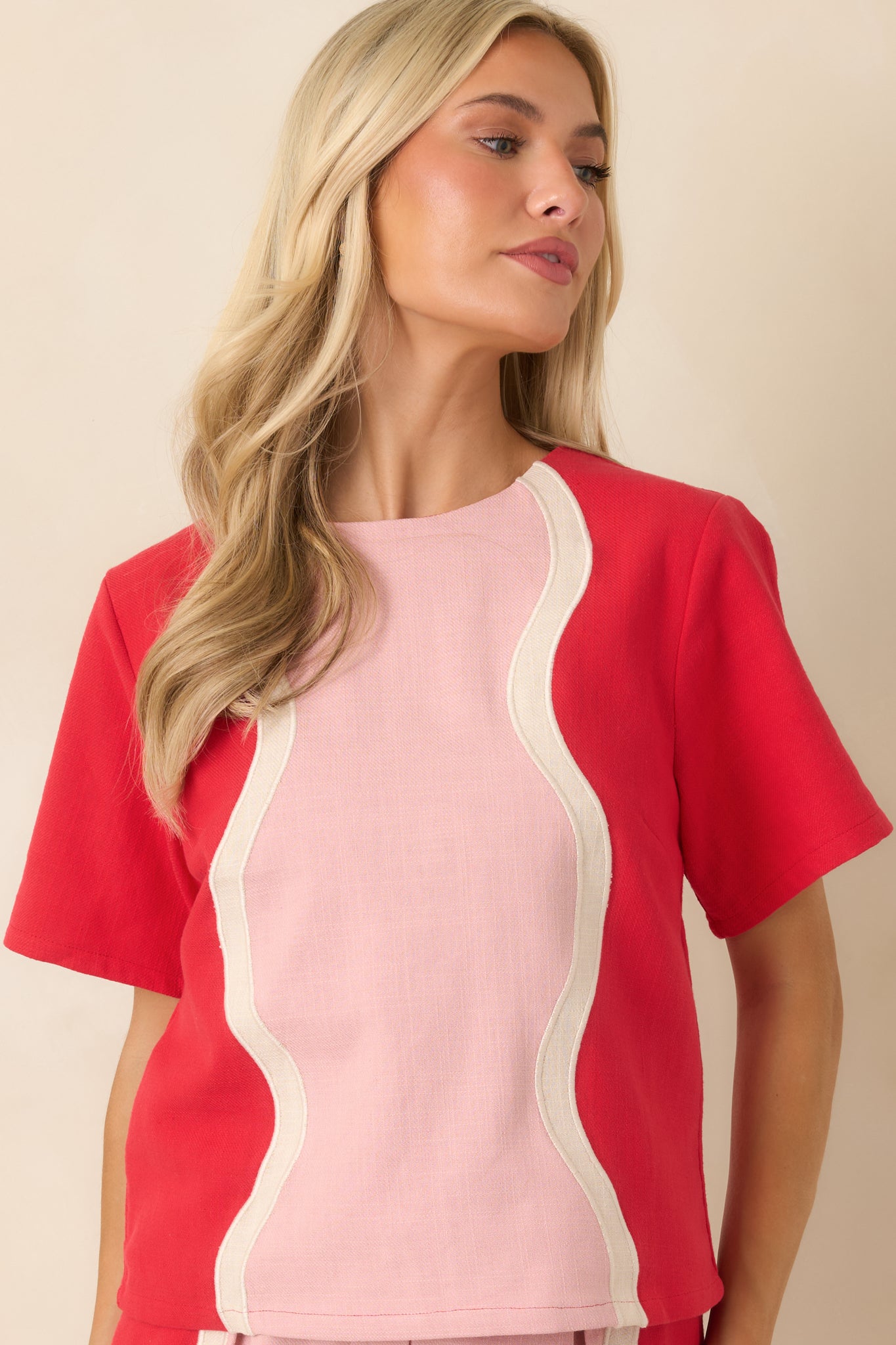 Short sleeve top featuring vibrant color panels and a relaxed everyday shape.