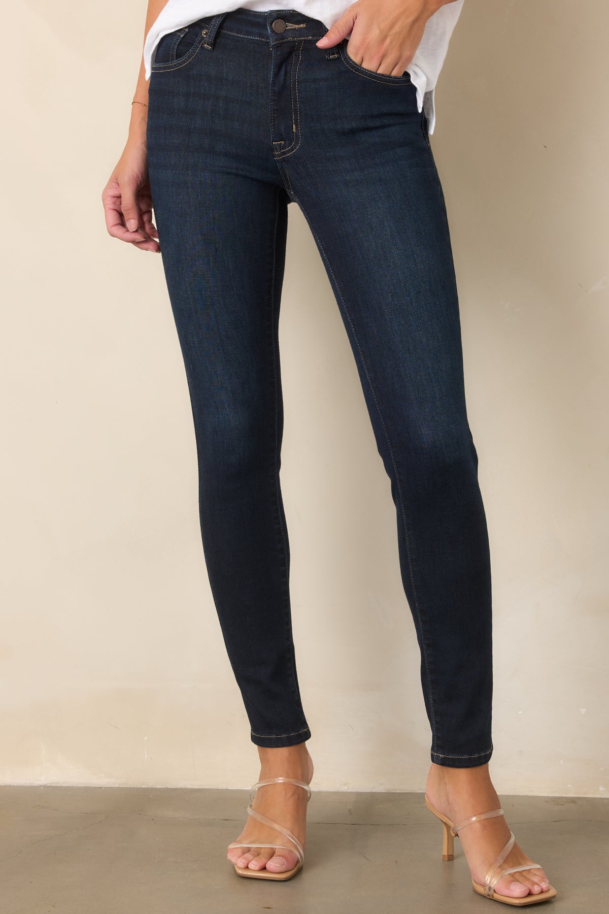 Skinny jeans showcasing the rich dark wash and streamlined front shape