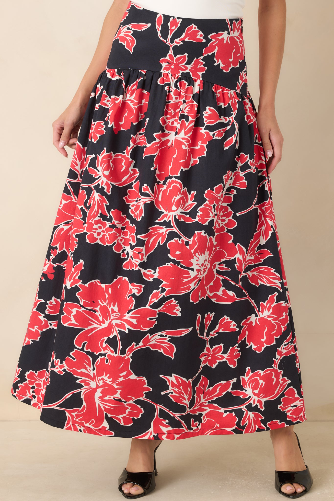 The front of this skirt highlights the high-rise waistband and softly gathered detailing.