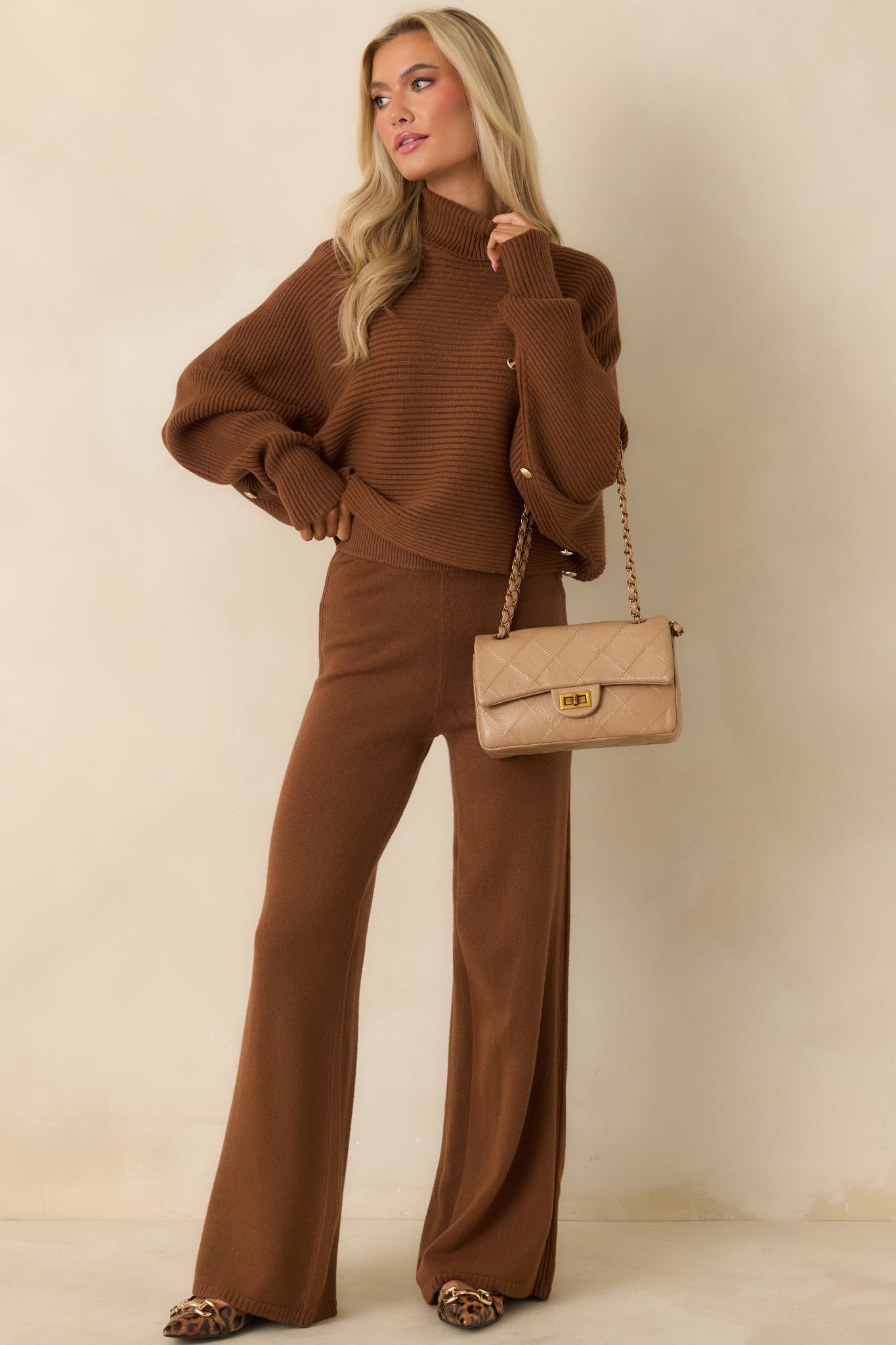 Front view of soft brown pull-on pants featuring straight leg and ribbed side detailing.