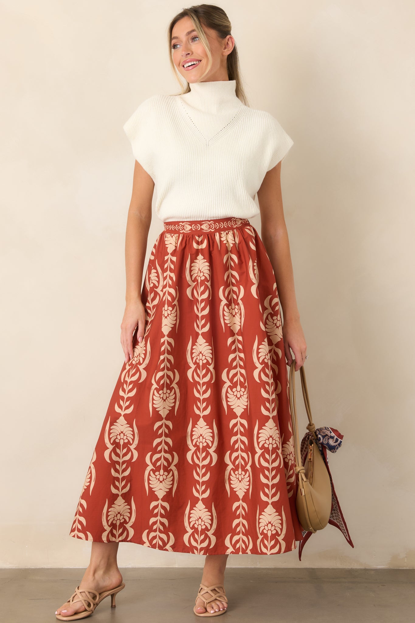 Soft cotton A-line skirt designed with a clean front waistband and a relaxed shape that moves beautifully.