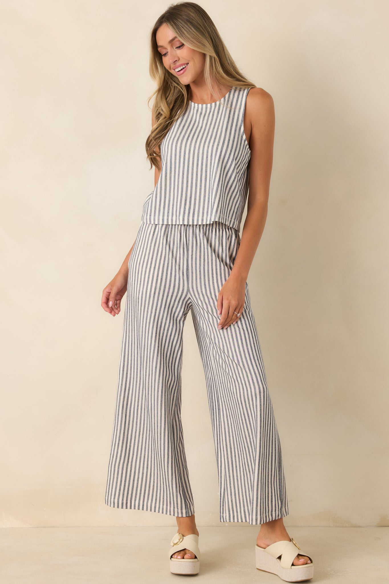 Soft cotton knit pants with classic stripes, relaxed wide legs, and an effortless everyday fit.