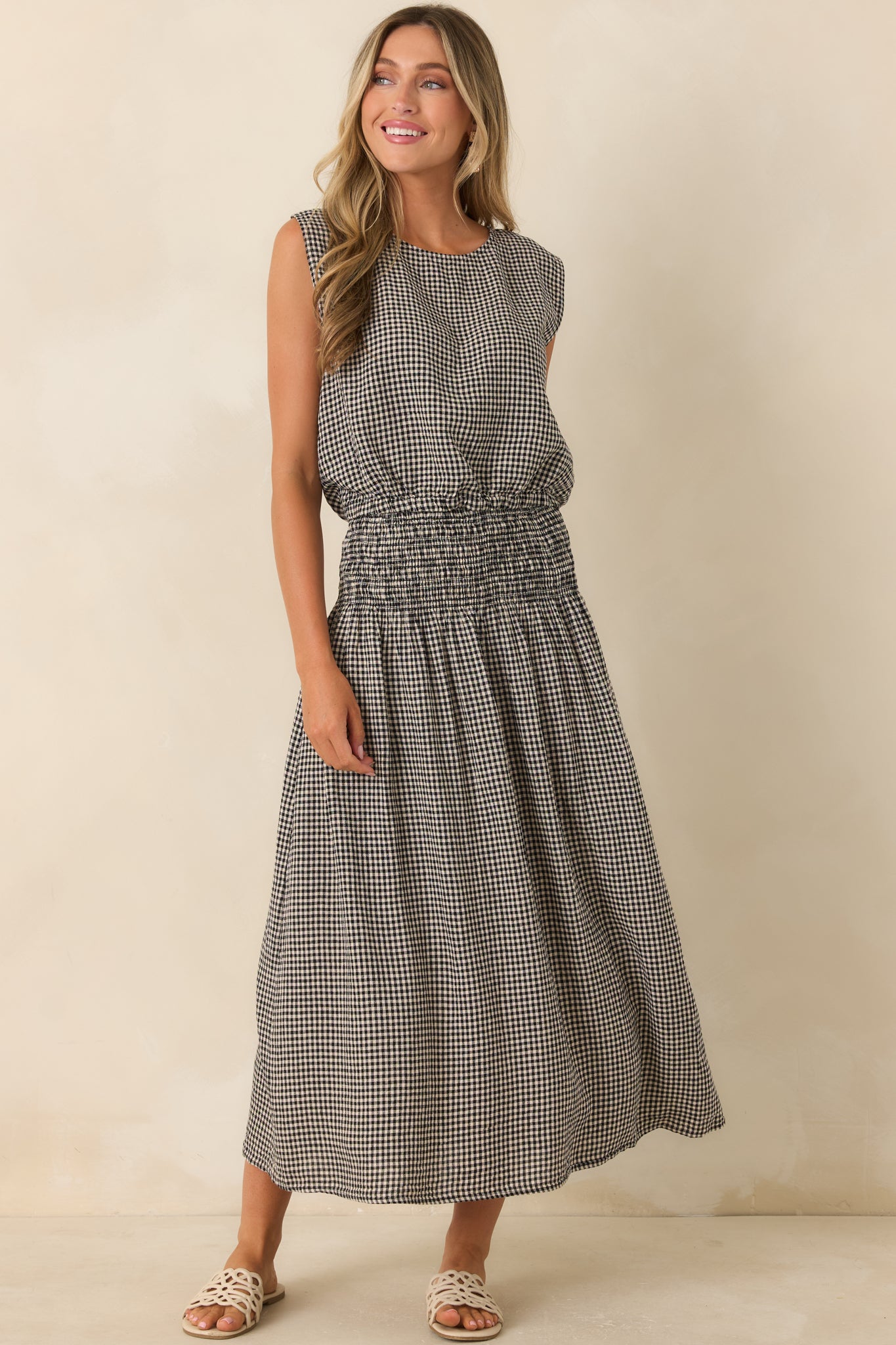 Soft textured linen rayon top designed with a comfortable fit and softly gathered hemline.