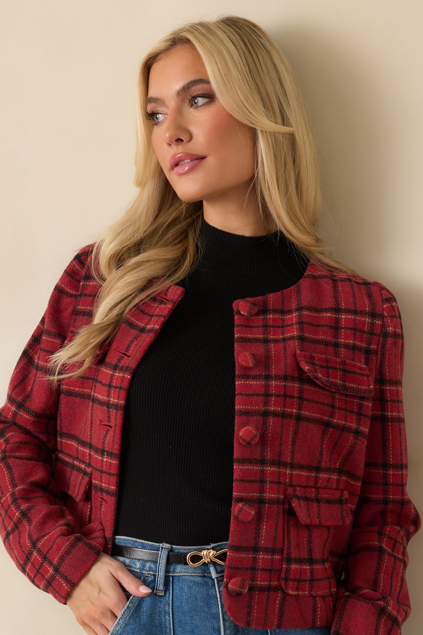 Soft textured woven jacket featuring flap pockets and polished button-front closure.