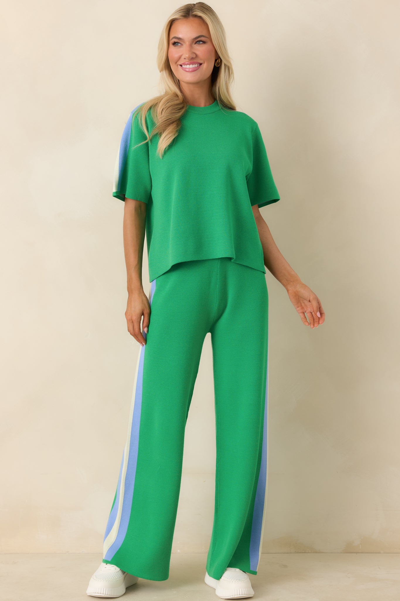 Soft knit top with slightly draped silhouette and casual, modern style.