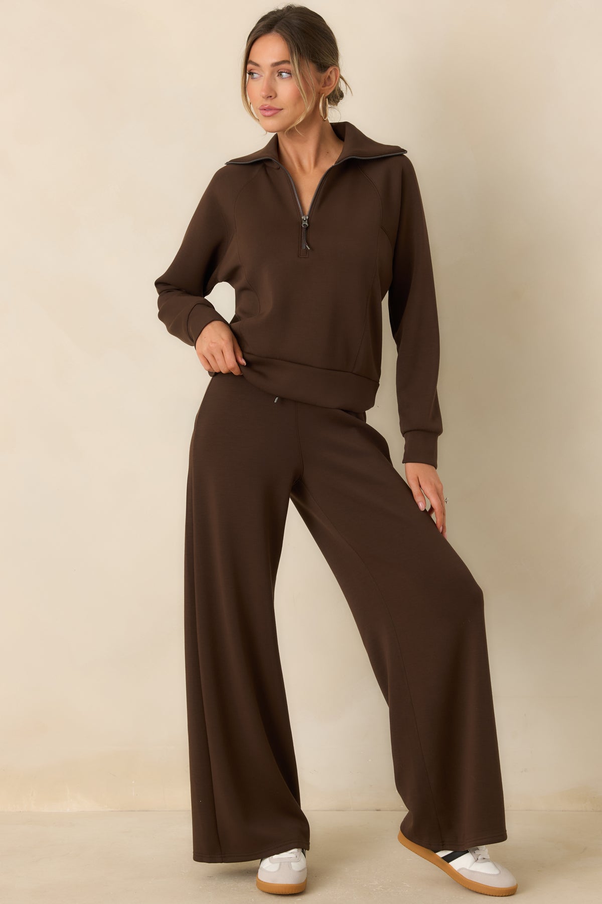 Relaxed spacer fabric pullover with an oversized collar, half-zip neckline, and wide banded hem.