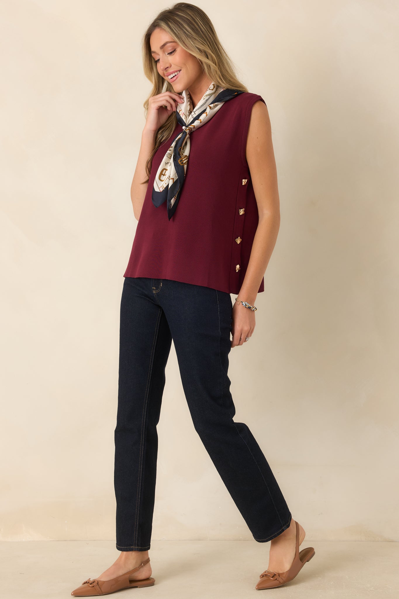 Straight-leg indigo jeans featuring a button and zipper closure with a versatile silhouette for everyday wear.