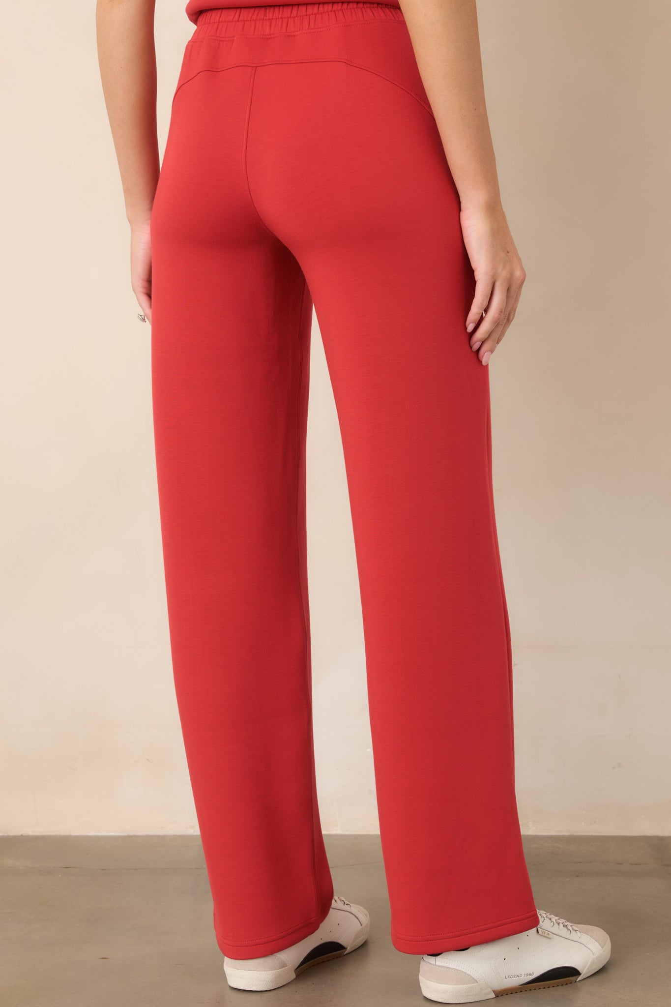 Rear view of the relaxed straight-leg pants showcasing the smooth pull-on waistband and fluid drape.