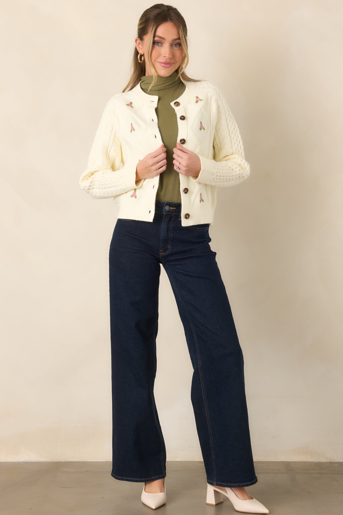 Structured stretch cotton jeans showcasing a rich dark wash, high-rise waistband, and relaxed full-length wide-leg silhouette.