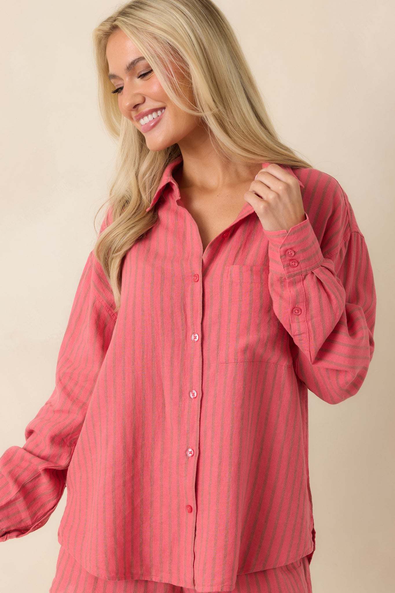 Striped collared shirt showing relaxed fit and easy layering silhouette.