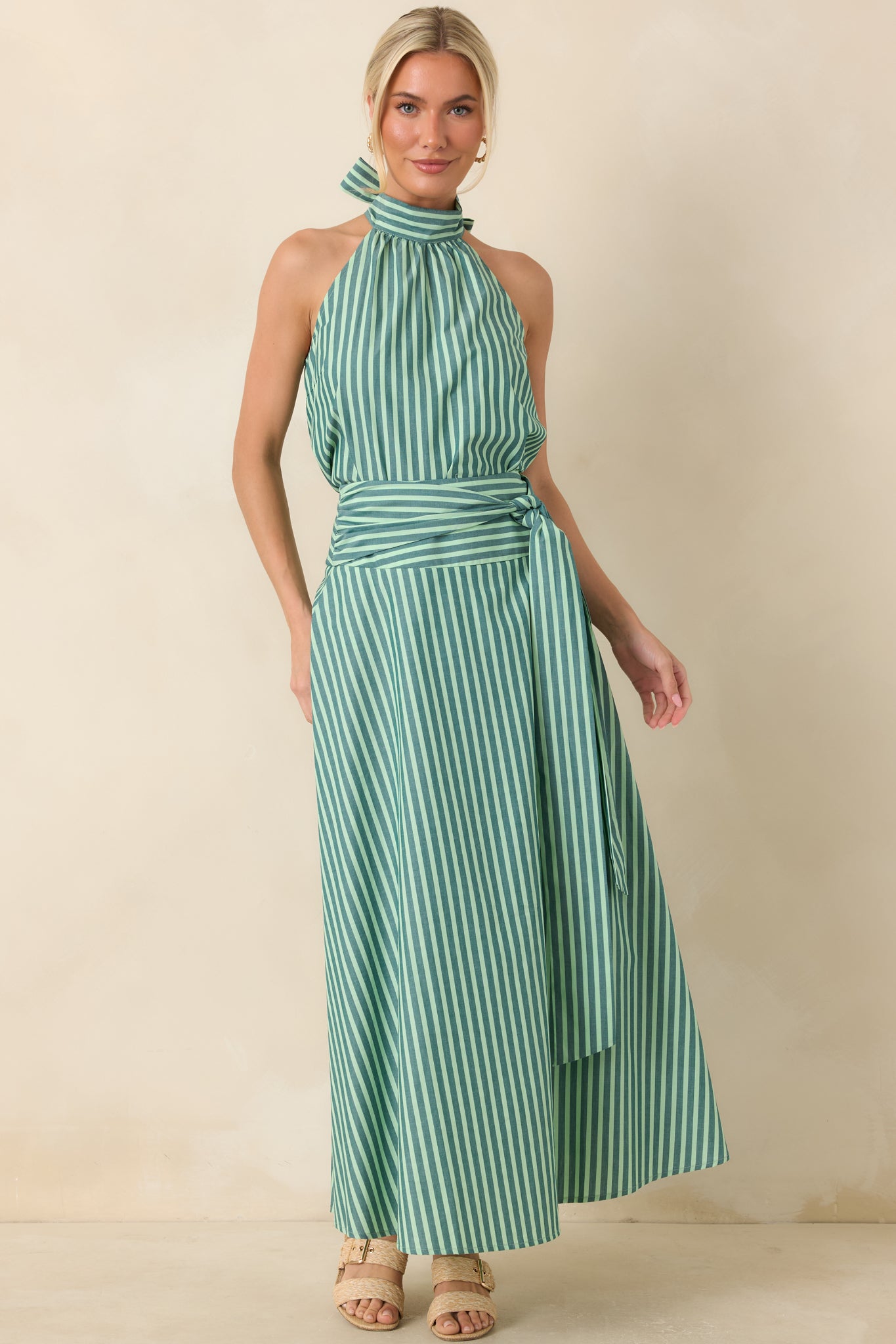 Striped cotton maxi skirt designed with a defined high waist, statement self-tie sash, and a graceful sweeping shape for effortless everyday styling.