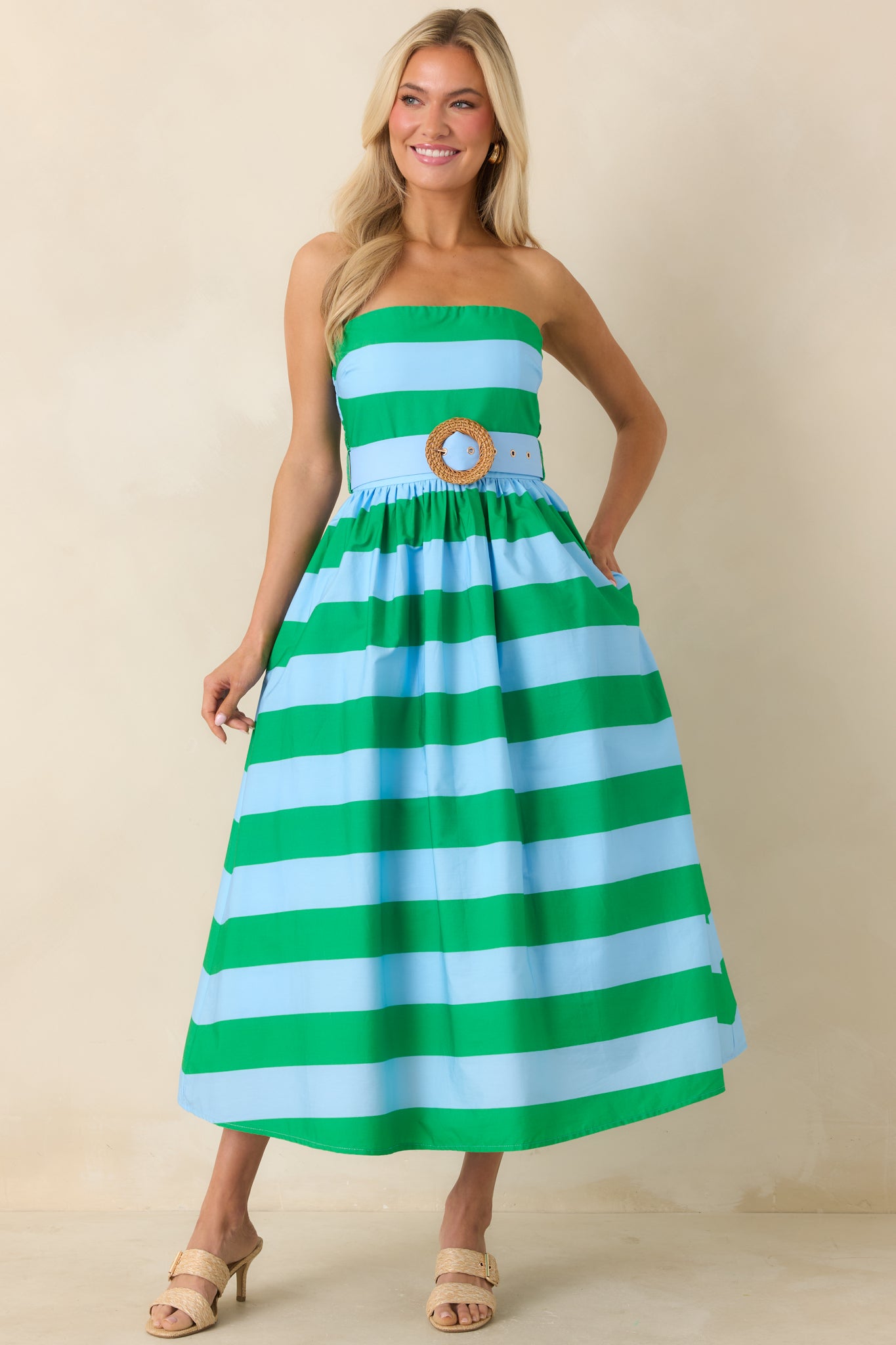 Striped, midi dress with waist belt and soft, voluminous skirt movement.